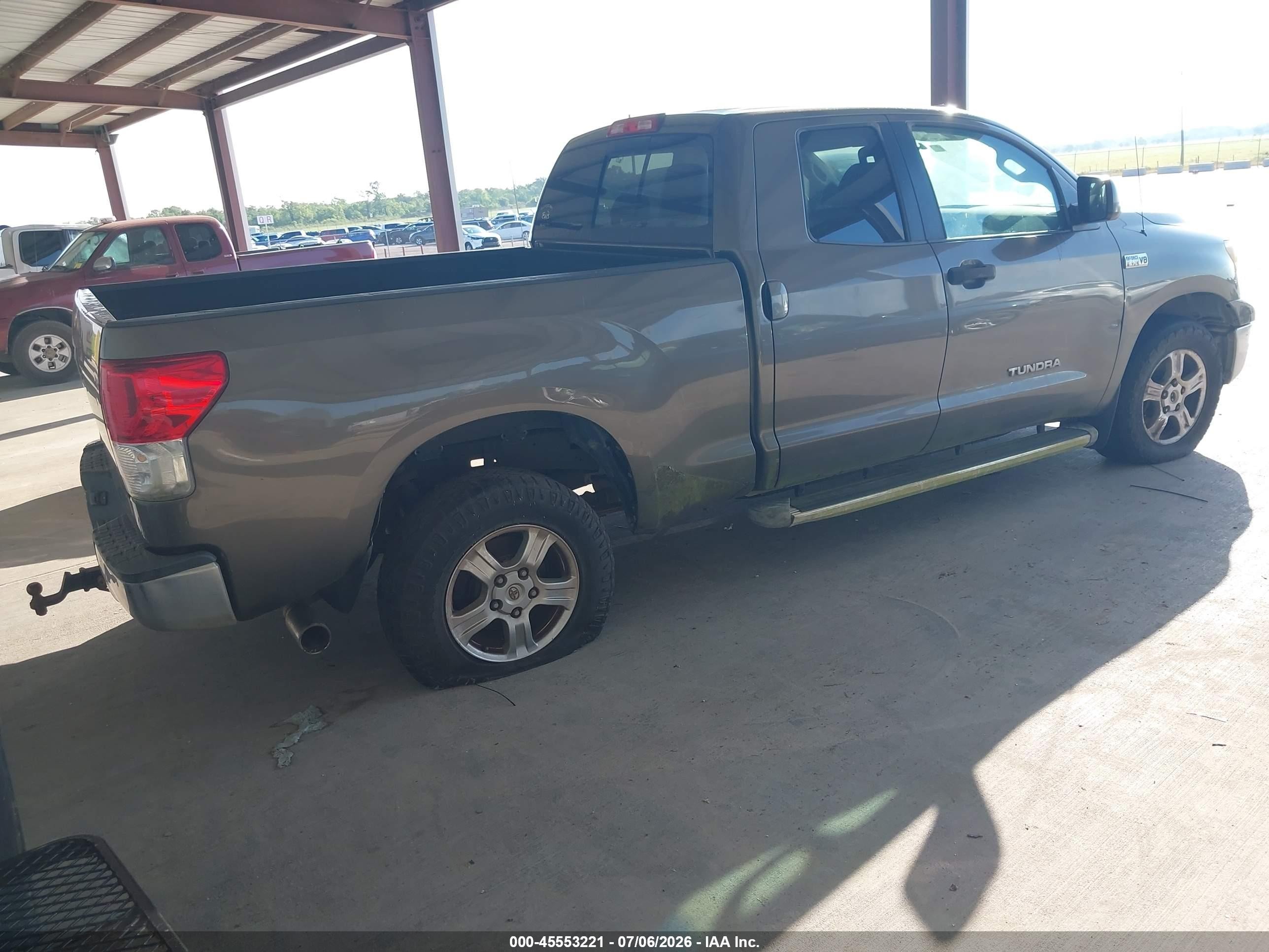 2010 Toyota Tundra Grade 5.7l V8 Tan vin: 5TFRY5F12AX075420