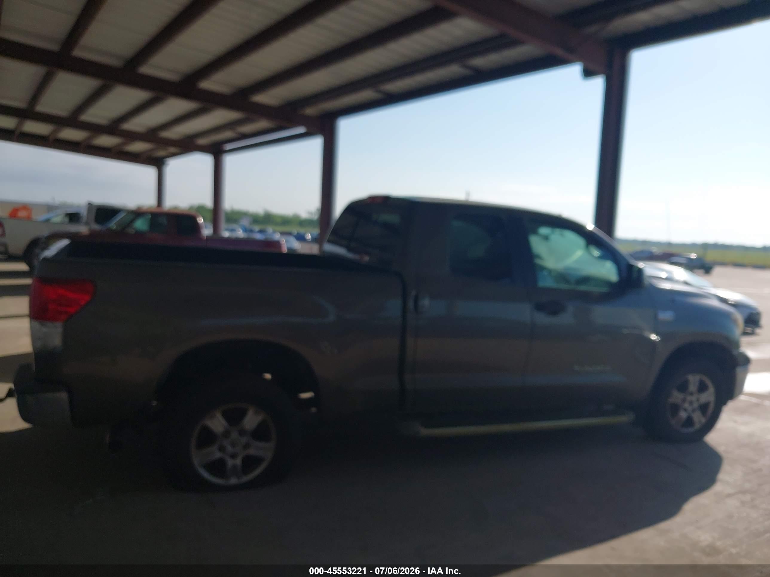 2010 Toyota Tundra Grade 5.7l V8 Tan vin: 5TFRY5F12AX075420