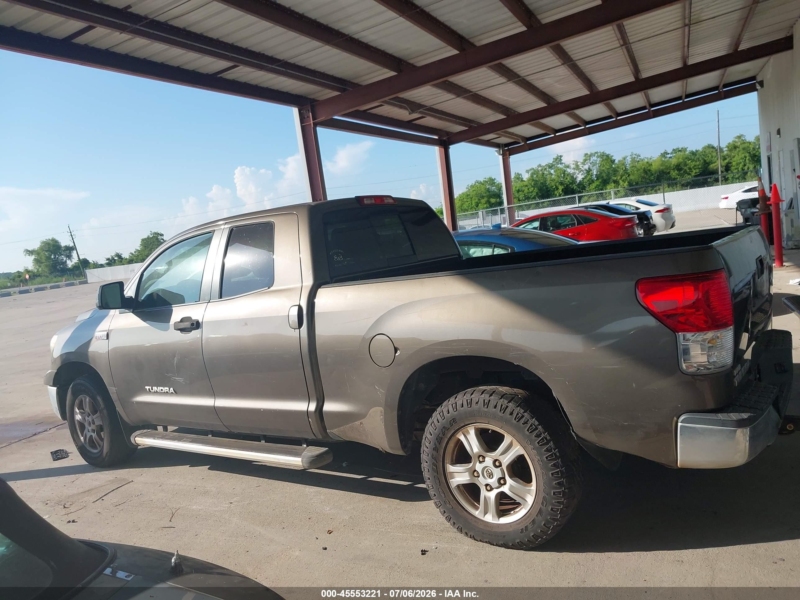 2010 Toyota Tundra Grade 5.7l V8 Tan vin: 5TFRY5F12AX075420