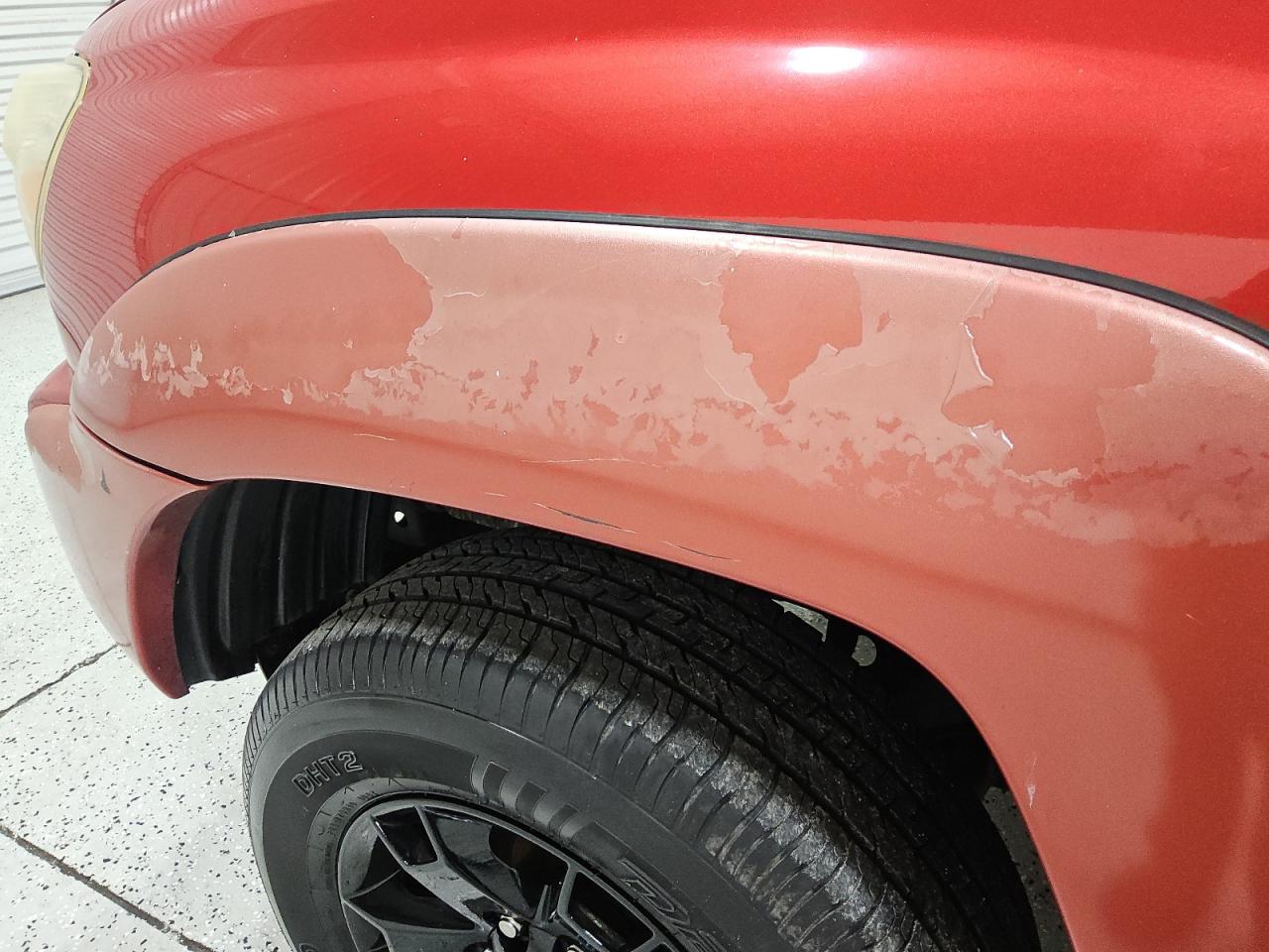 2013 Toyota Tacoma Prerunner Access Cab Red vin: 5TFTX4GN5DX021957 Damage: Left Front Wheel Opening Mldg, Peeling, > 12 Inches