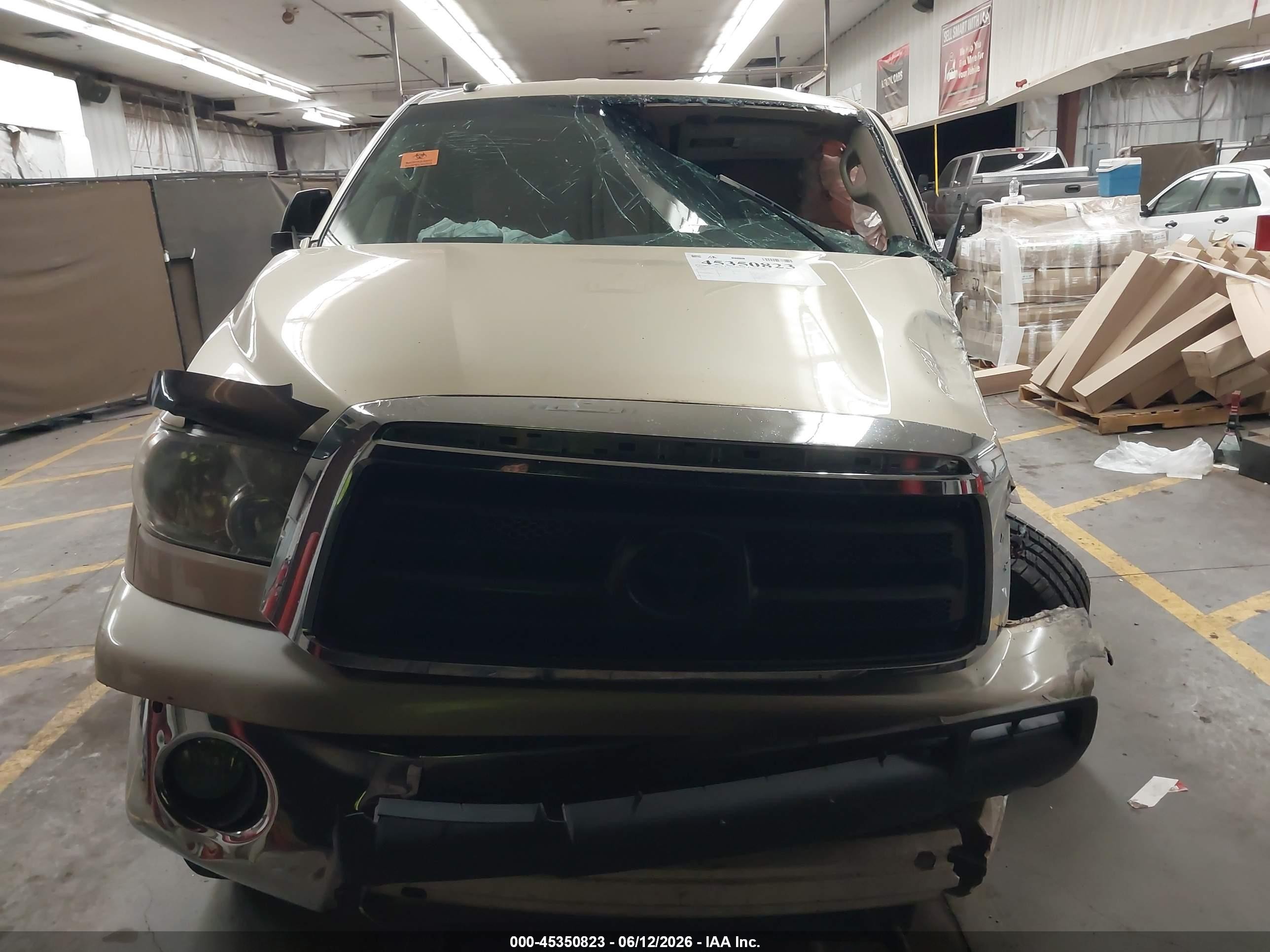 2010 Toyota Tundra Grade 5.7l V8 Tan vin: 5TFUW5F19AX116612