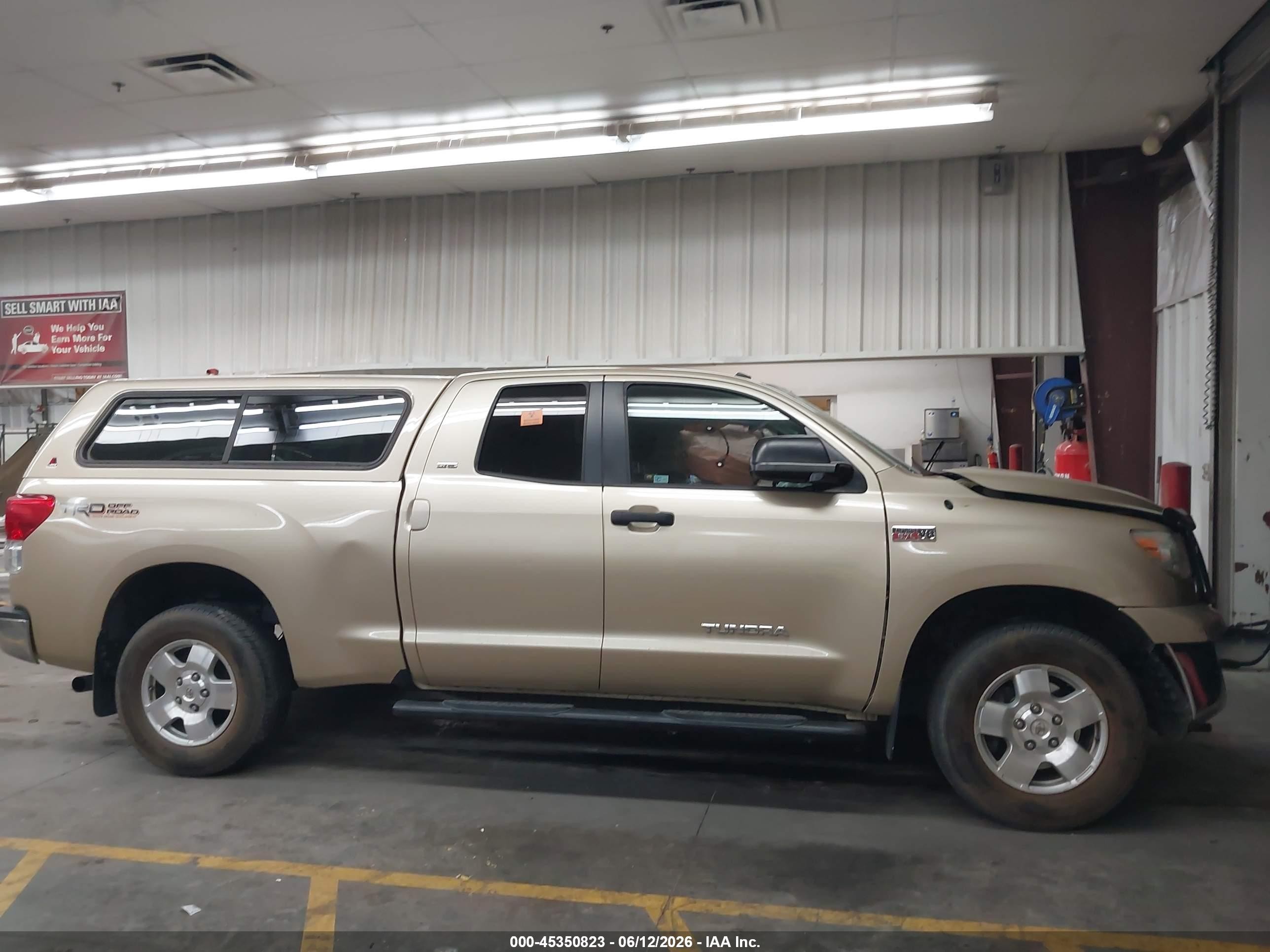 2010 Toyota Tundra Grade 5.7l V8 Tan vin: 5TFUW5F19AX116612