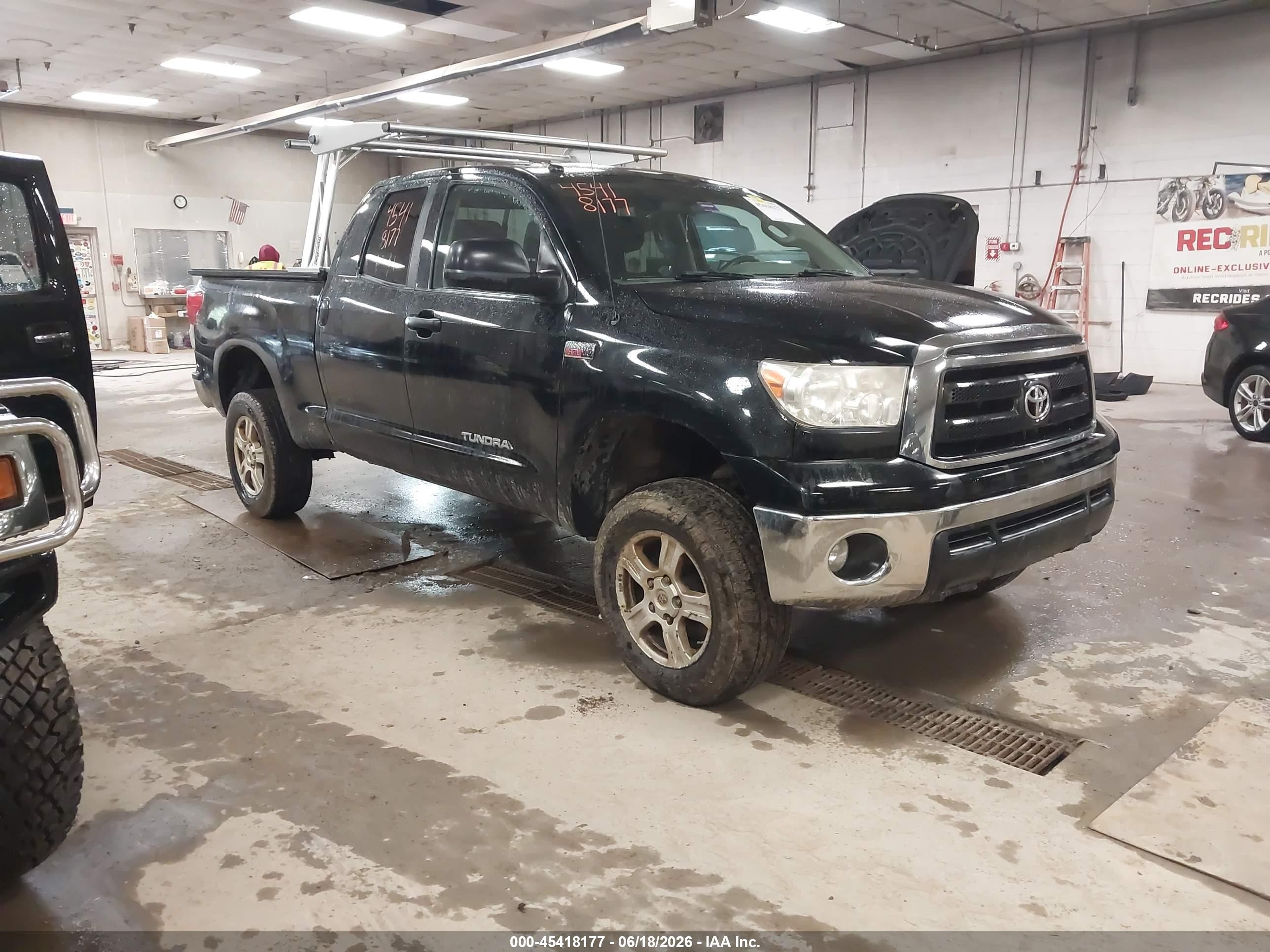 2012 Toyota Tundra Grade 5.7l V8 Черный vin: 5TFUY5F14CX231471