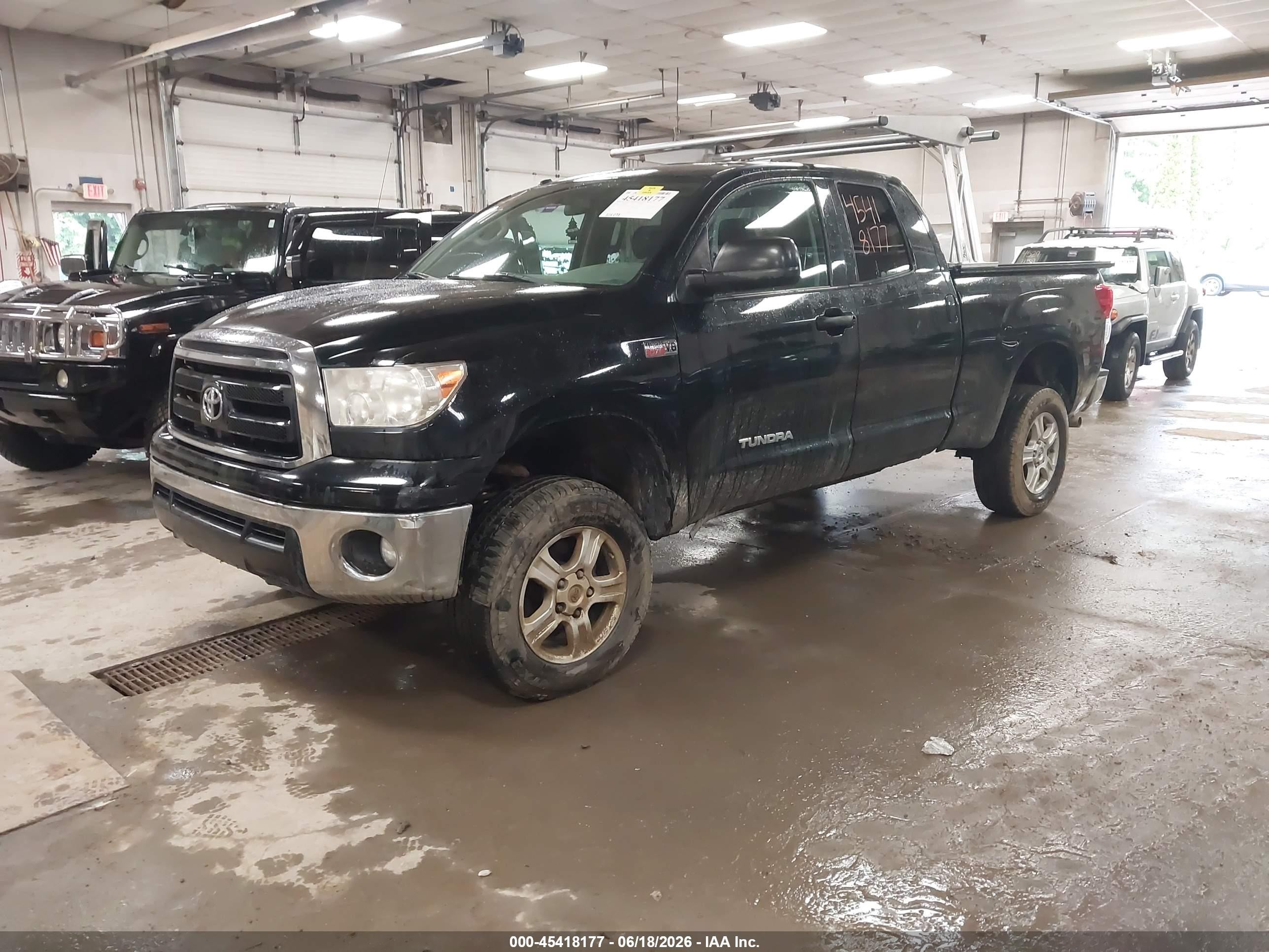 2012 Toyota Tundra Grade 5.7l V8 Черный vin: 5TFUY5F14CX231471