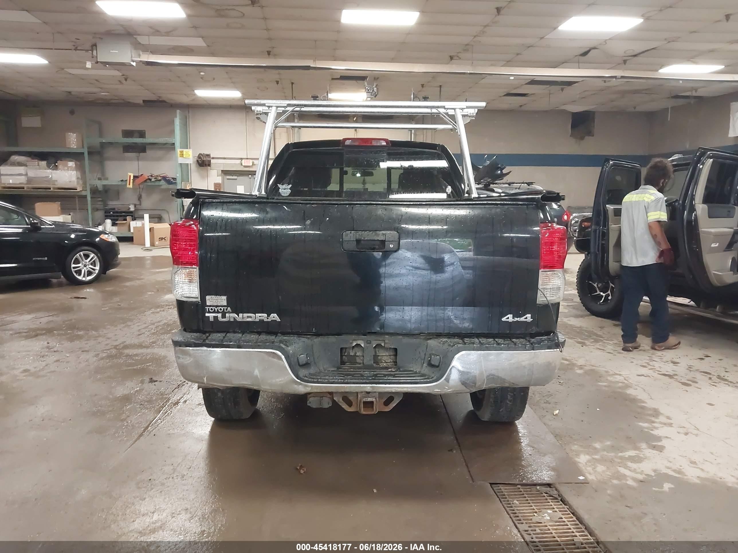2012 Toyota Tundra Grade 5.7l V8 Черный vin: 5TFUY5F14CX231471