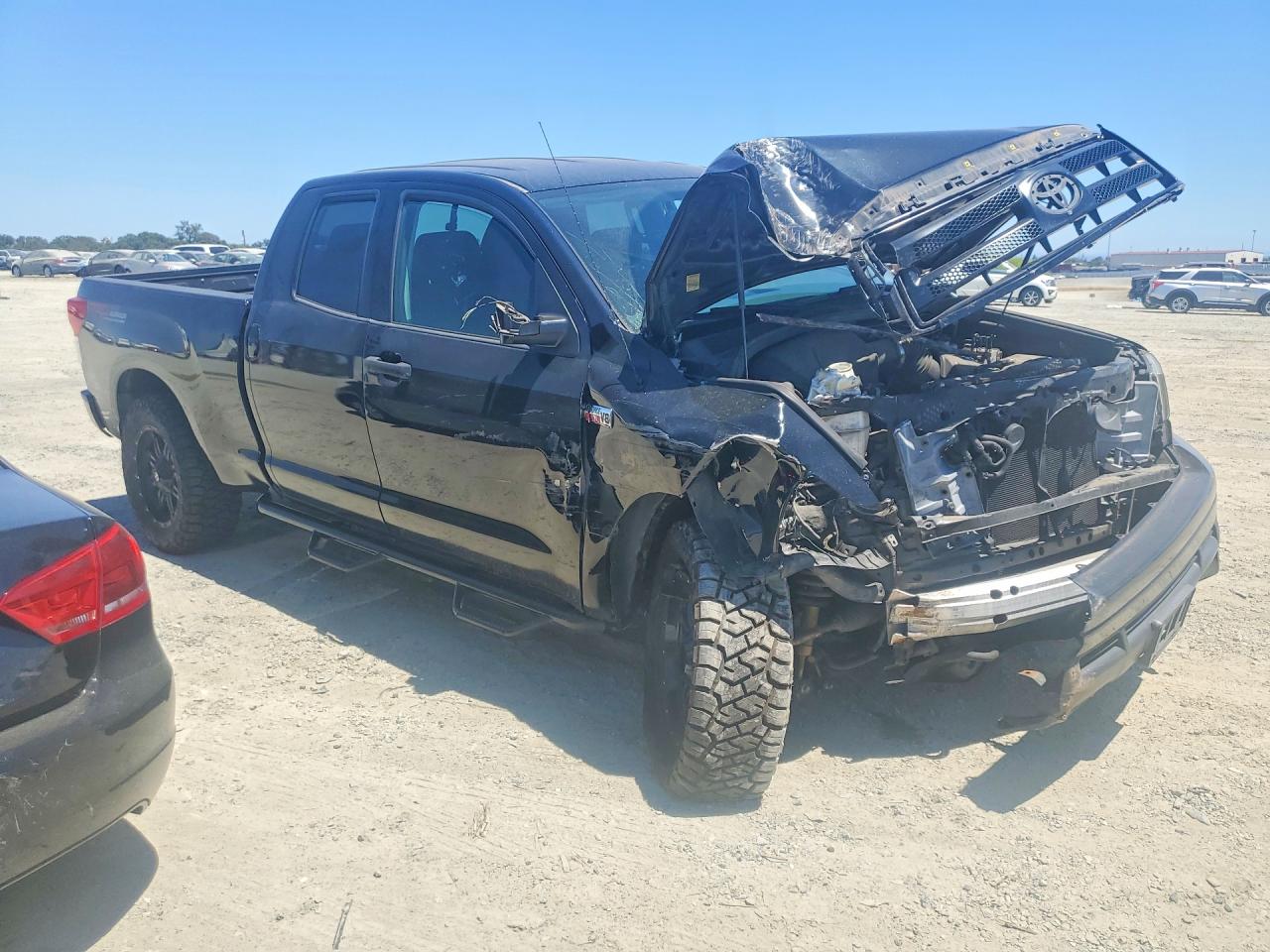 2012 Toyota Tundra Black vin: 5TFUY5F16CX266061