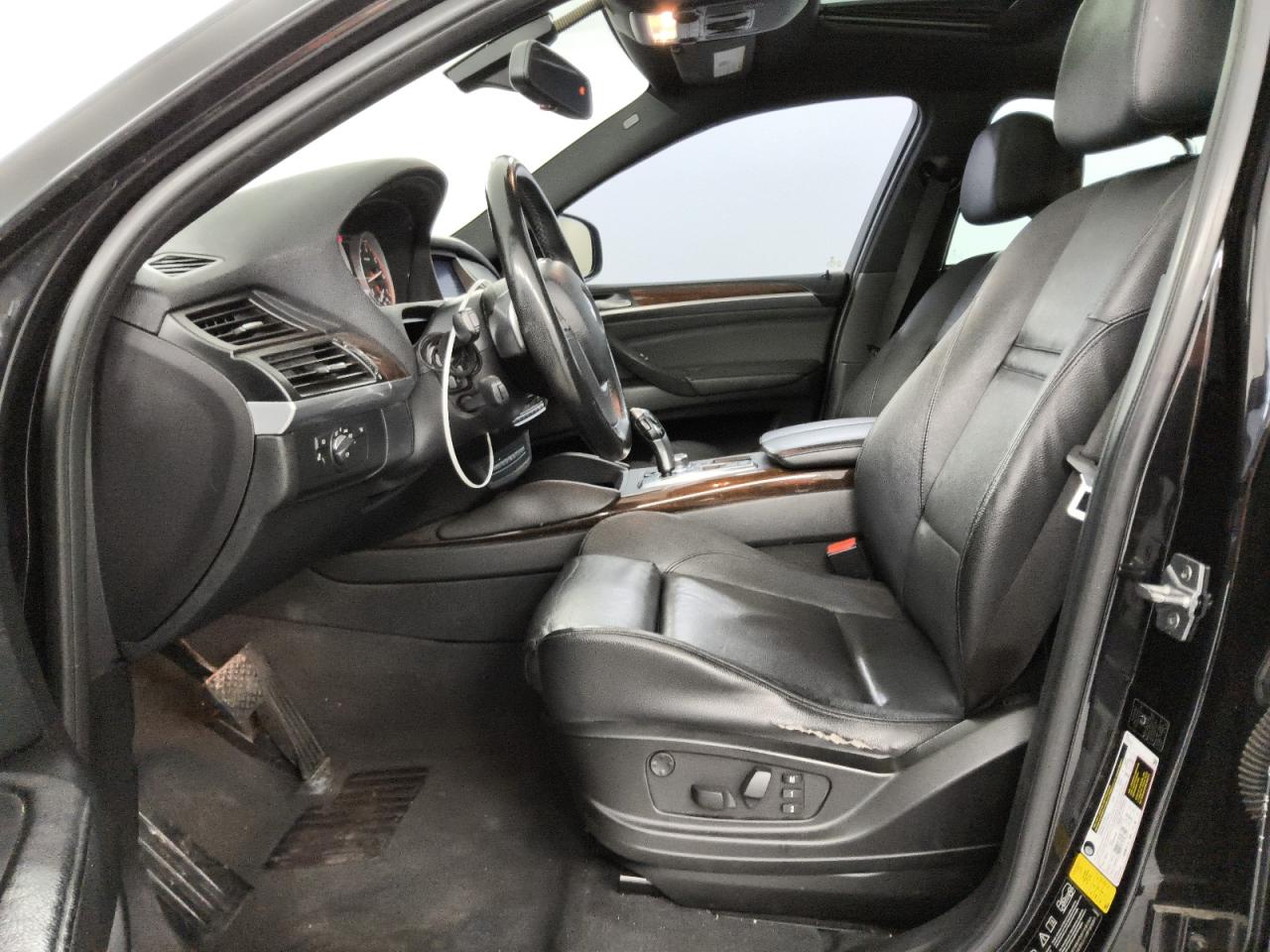 2011 Bmw X6 Xdrive50i Black vin: 5UXFG8C56BLZ95976 Damage: Left Front Seat Cushion, Torn, 5 To 6 Inches
