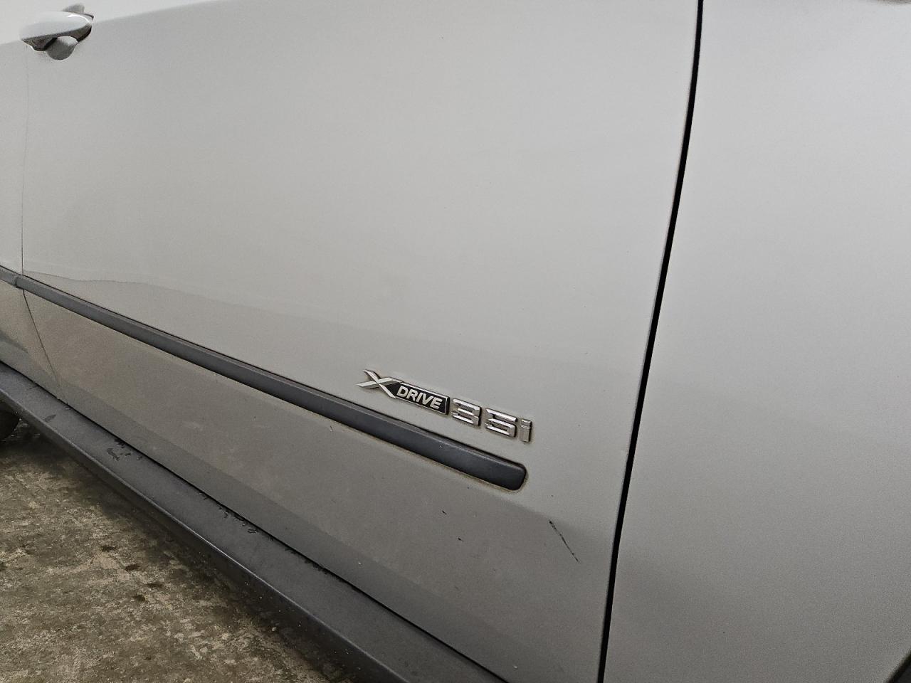2013 Bmw X5 Xdrive35i Silver vin: 5UXZV4C53D0E00908 Damage: Right Front Door, Dent(S) W/ Paint Dmg, < 1/8 Inch