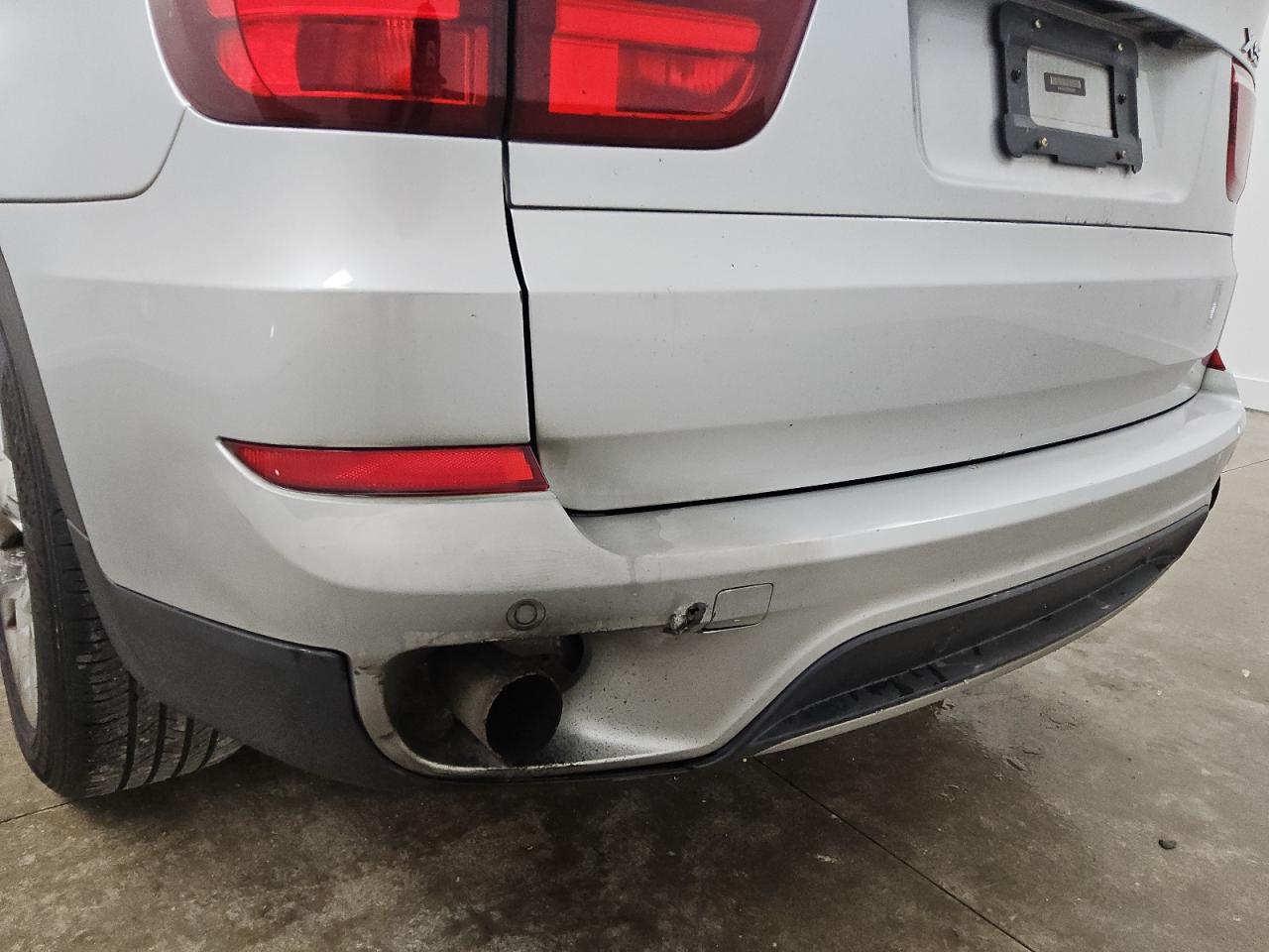 2013 Bmw X5 Xdrive35i Silver vin: 5UXZV4C53D0E00908 Damage: Rear Bumper, Gouged, 1 To 2 Inches