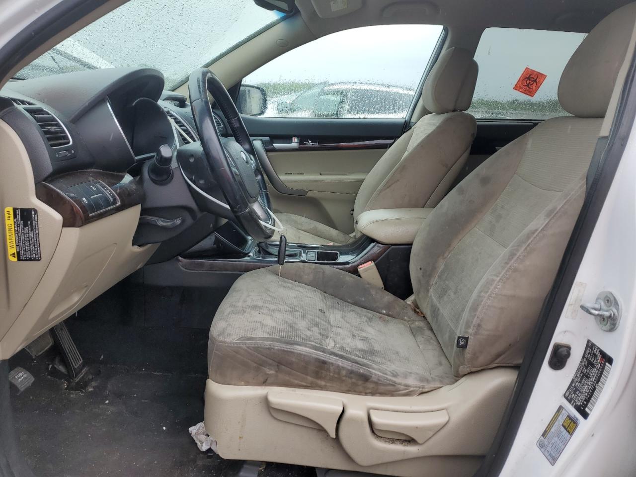 2015 Kia Sorento Lx White vin: 5XYKTCA65FG607809 Damage: Left Front Seat Cushion, Stained, Permanent