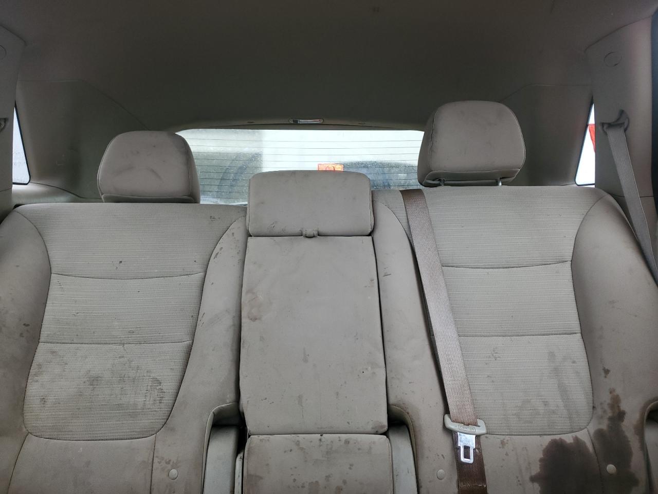 2015 Kia Sorento Lx White vin: 5XYKTCA65FG607809 Damage: Left Rear Seat Back, Stained, Permanent