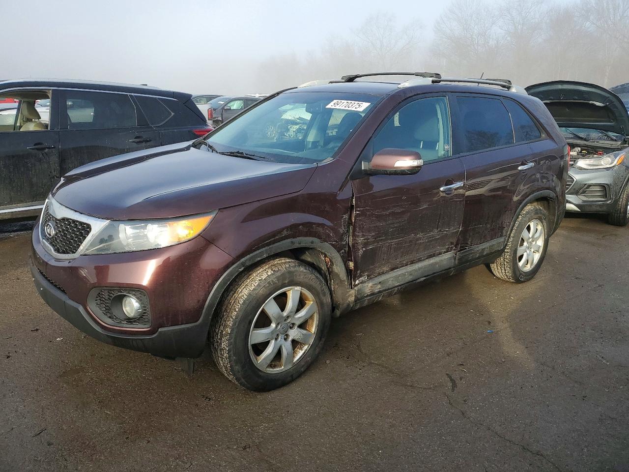2012 Kia Sorento Base Maroon vin: 5XYKTDA61CG299104