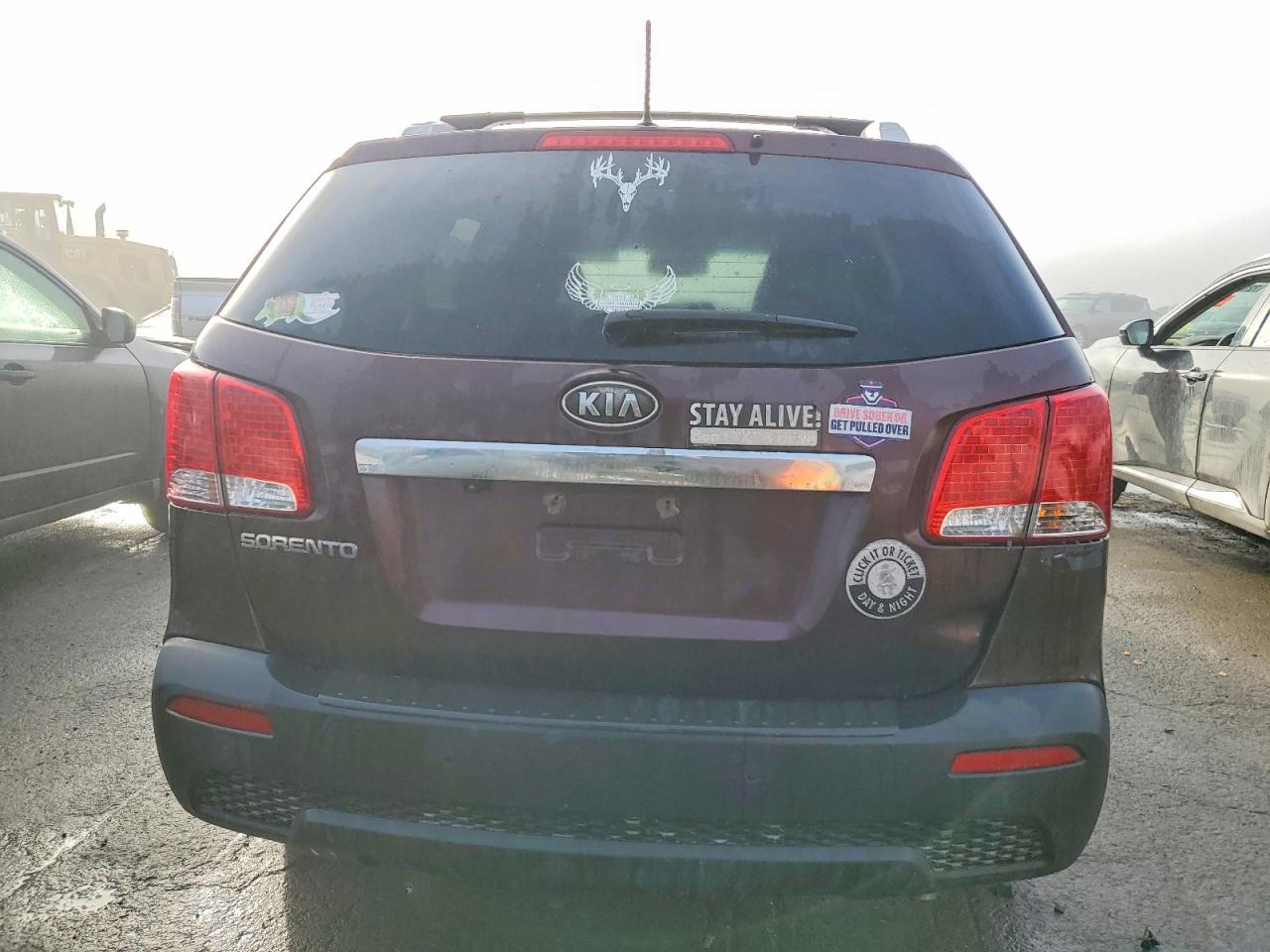 2012 Kia Sorento Base Maroon vin: 5XYKTDA61CG299104