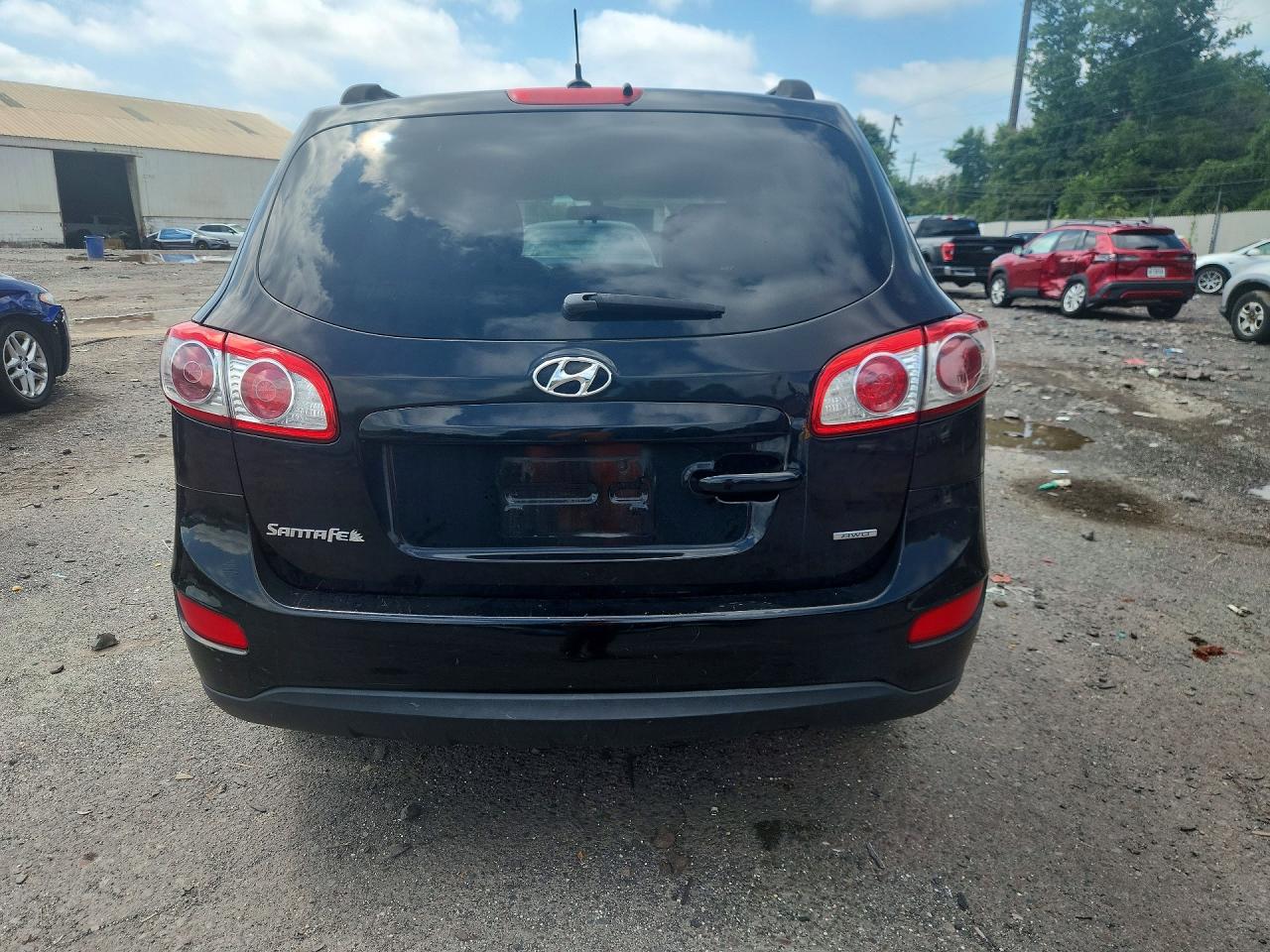 2012 Hyundai Santa Fe Gl(middle-low ) Black vin: 5XYZGDAB2CG126806