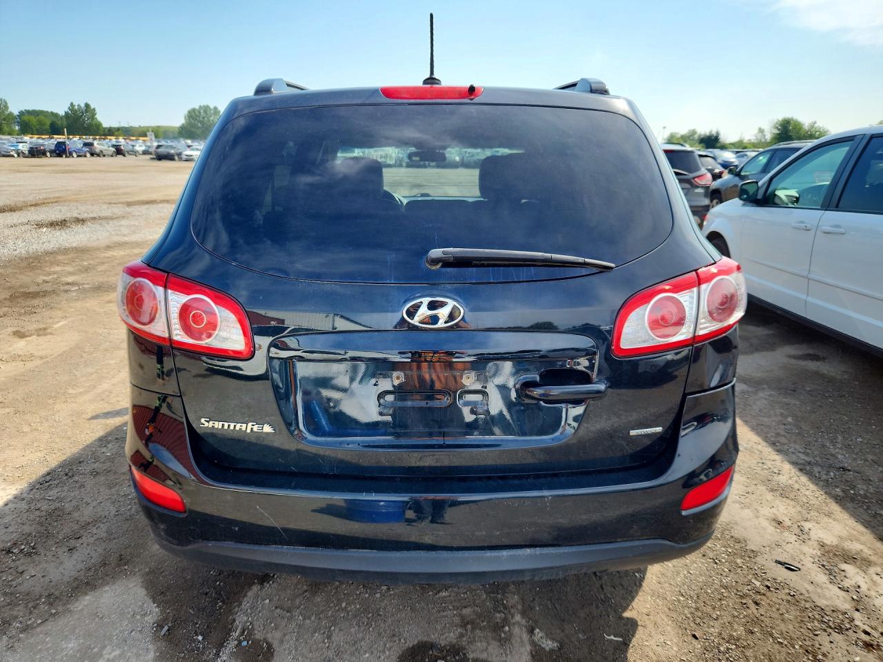 2012 Hyundai Santa Fe Gls Black vin: 5XYZGDAG9CG115037