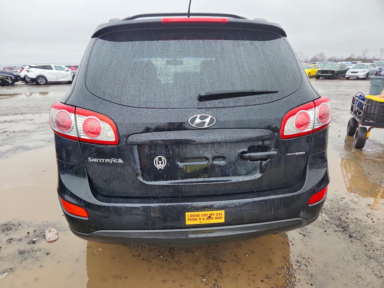 2012 Hyundai Santa Fe Se Black vin: 5XYZHDAG2CG157496
