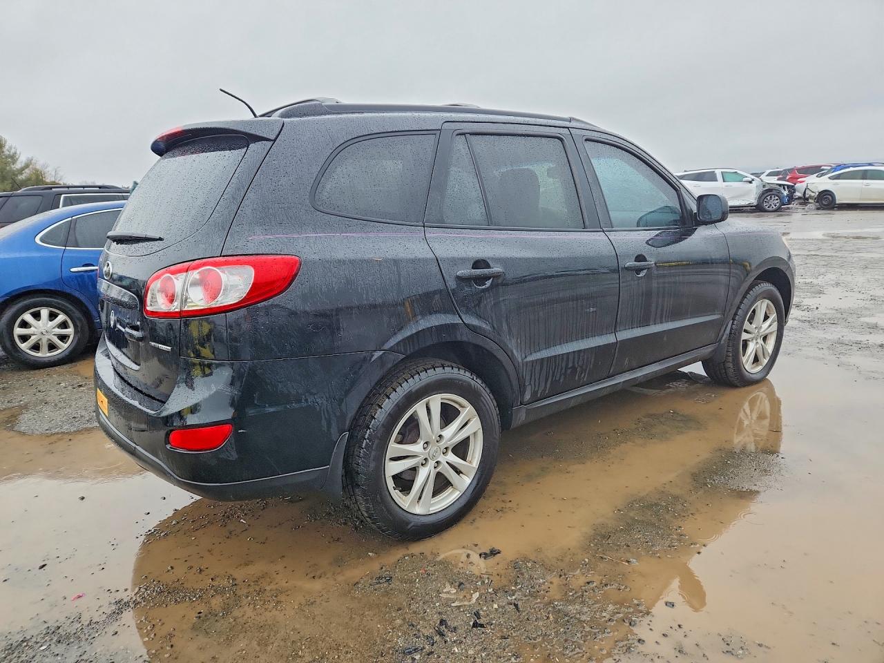 2012 Hyundai Santa Fe Se Black vin: 5XYZHDAG2CG157496