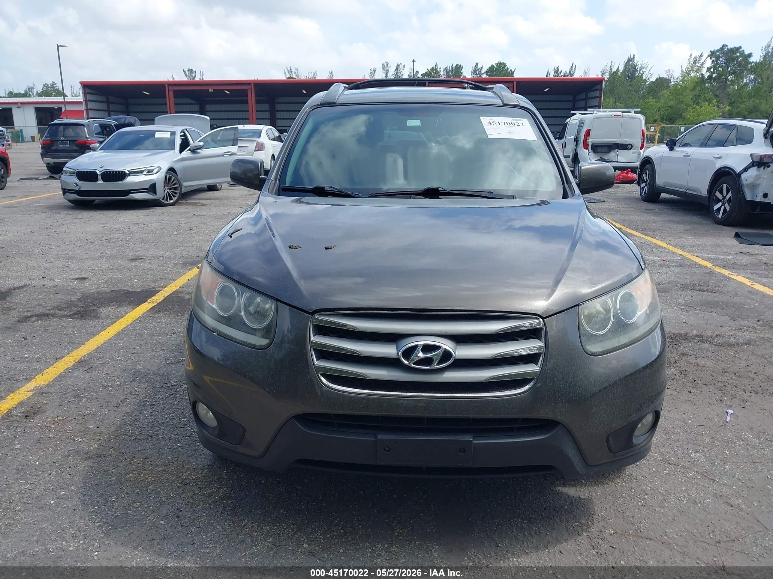 2012 Hyundai Santa Fe Se Brown vin: 5XYZHDAG6CG128745