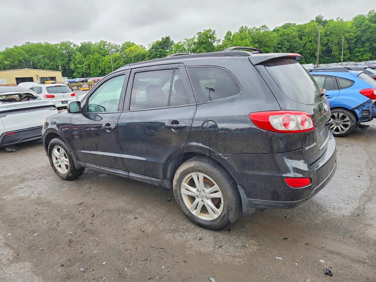 2012 Hyundai Santa Fe Se Black vin: 5XYZHDAG6CG140443