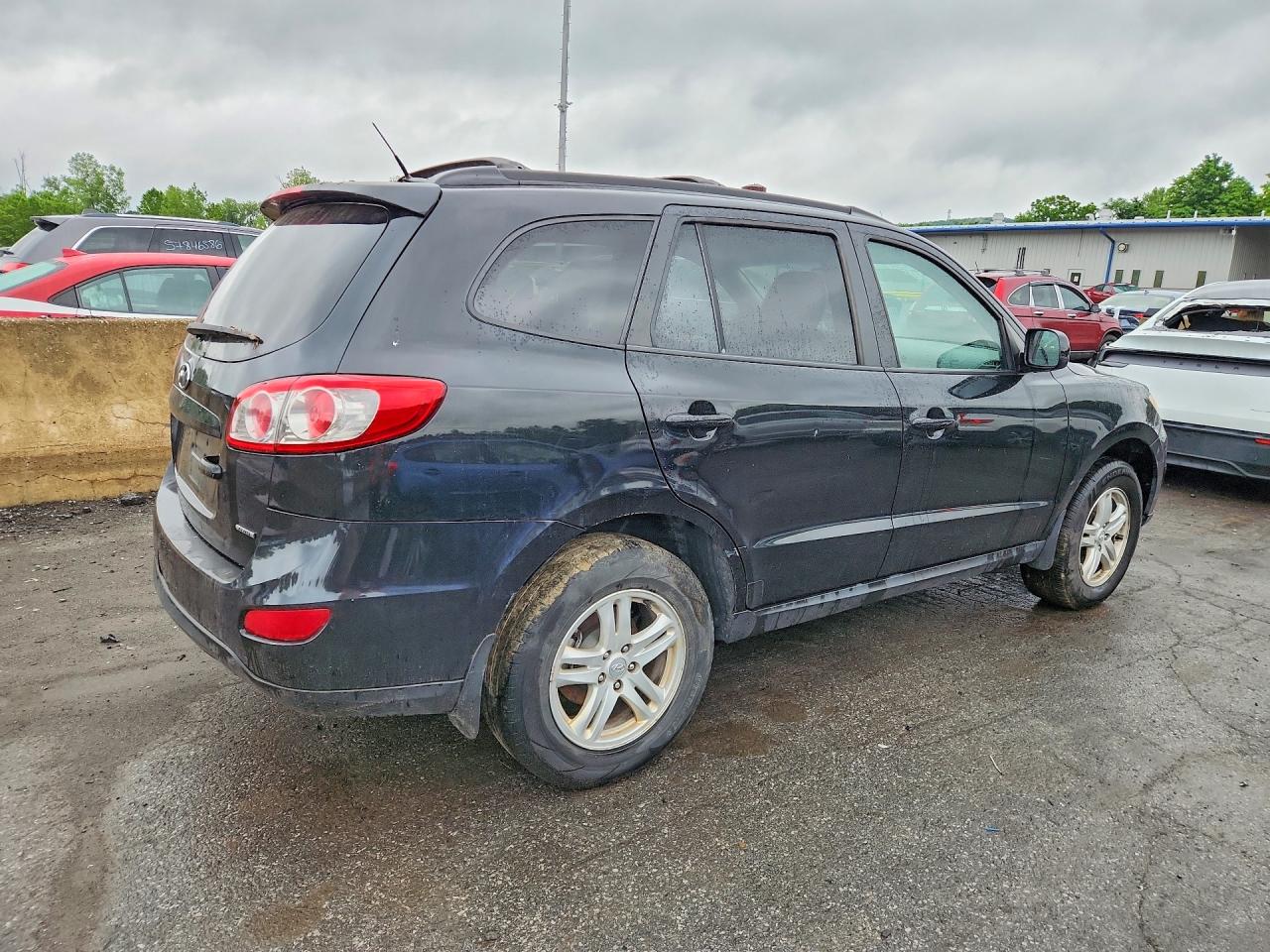 2012 Hyundai Santa Fe Se Black vin: 5XYZHDAG6CG140443