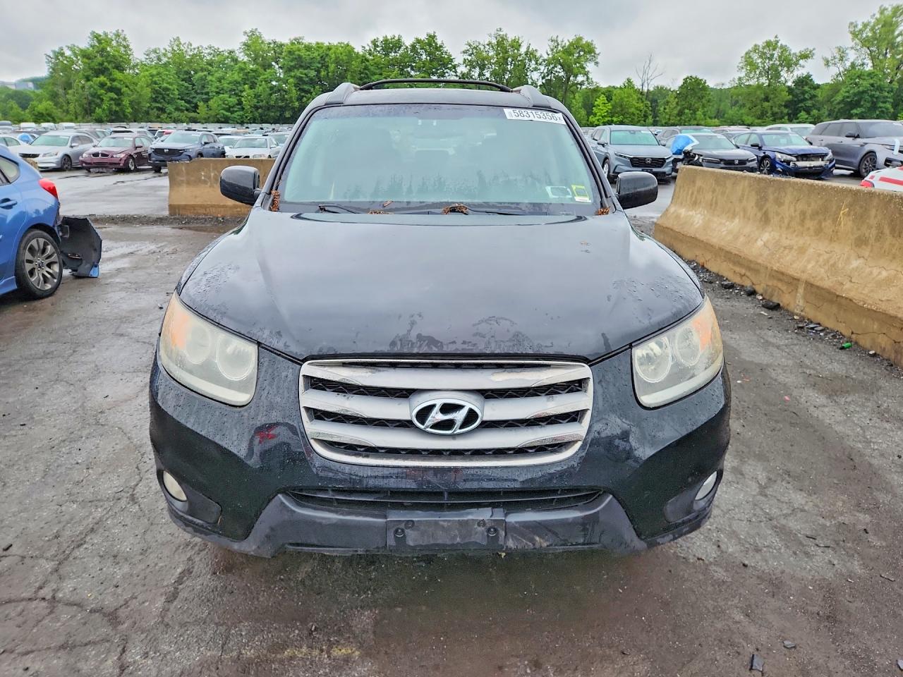 2012 Hyundai Santa Fe Se Black vin: 5XYZHDAG6CG140443
