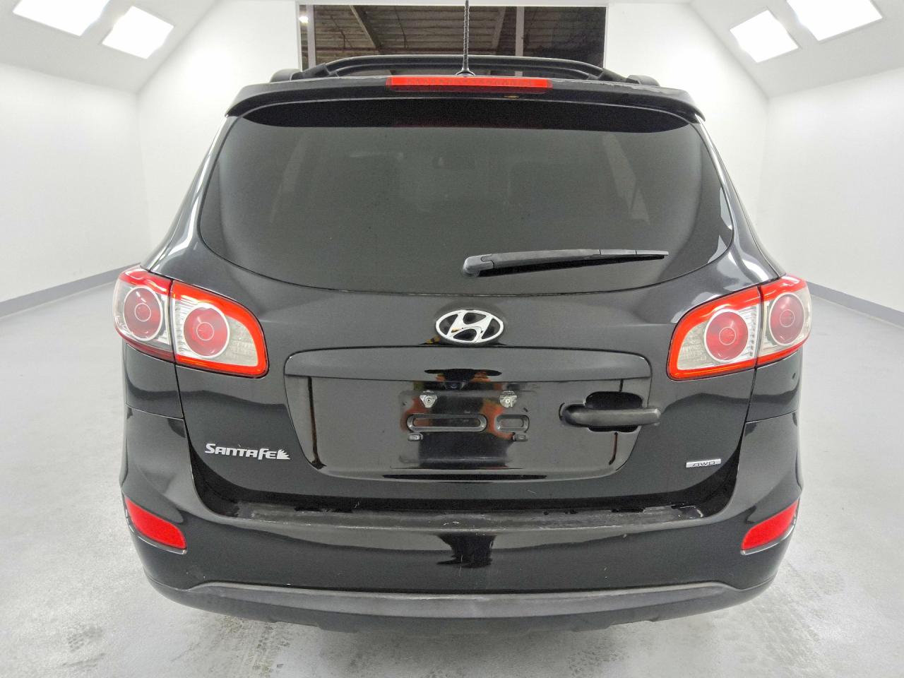 2012 Hyundai Santa Fe Se Black vin: 5XYZHDAGXCG098374