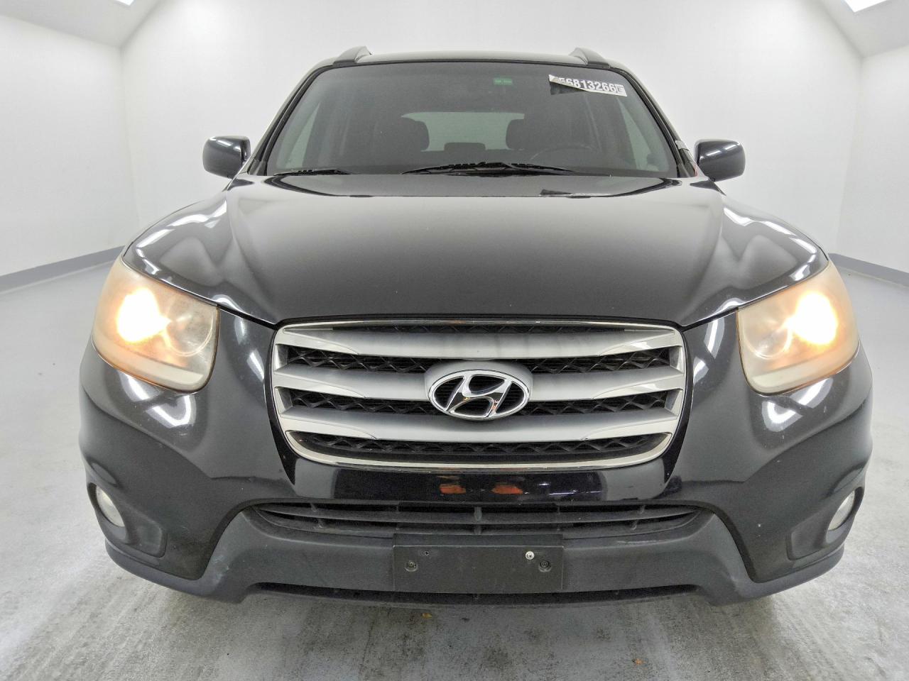 2012 Hyundai Santa Fe Se Black vin: 5XYZHDAGXCG098374