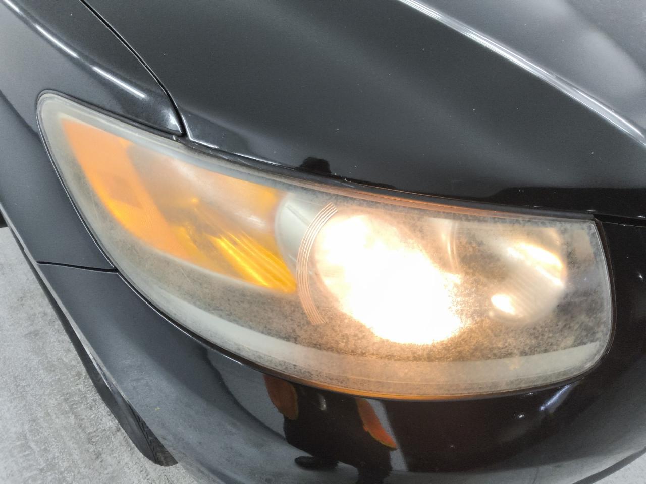 2012 Hyundai Santa Fe Se Black vin: 5XYZHDAGXCG098374 Damage: Right Head Lamp, Faded, Repair Required