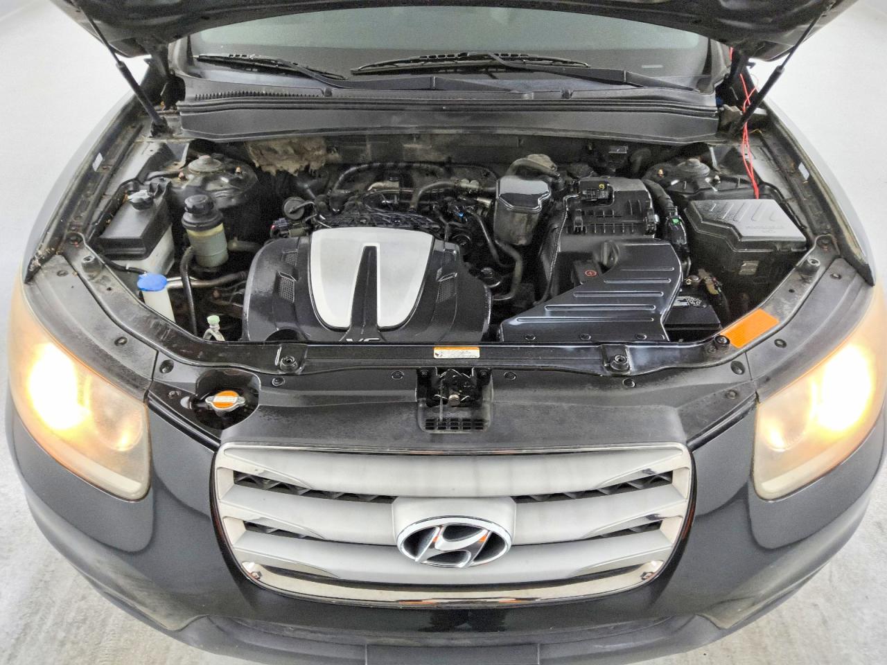 2012 Hyundai Santa Fe Se Black vin: 5XYZHDAGXCG098374