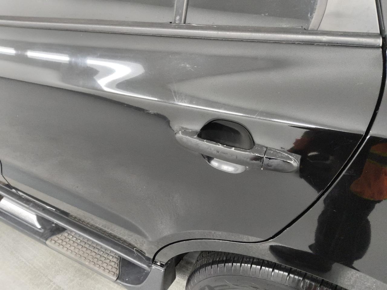 2012 Hyundai Santa Fe Se Black vin: 5XYZHDAGXCG098374 Damage: Left Rear Door, Heavy Scratch, 1/2 To 1 Inch