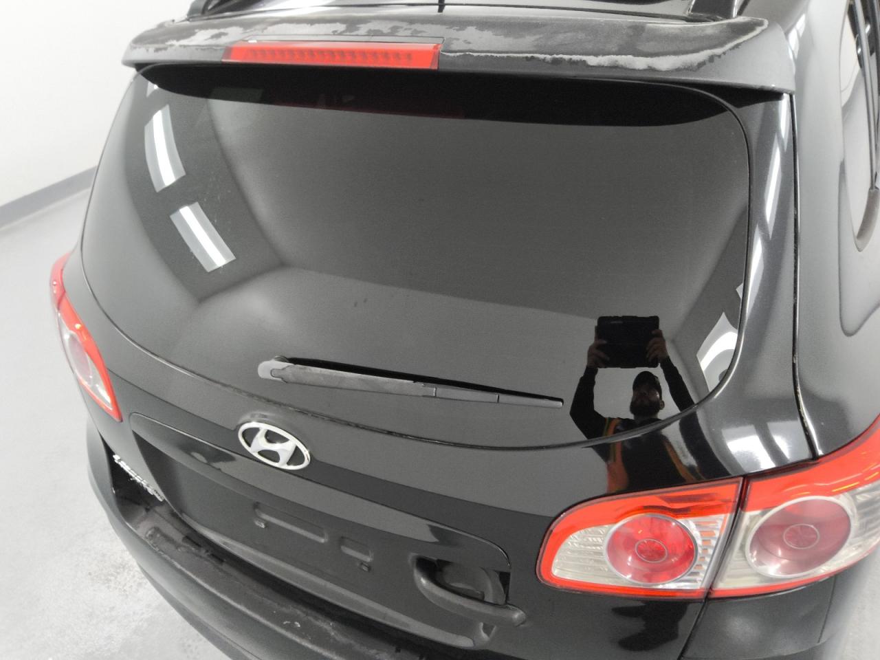 2012 Hyundai Santa Fe Se Black vin: 5XYZHDAGXCG098374 Damage: Lift Gate, Chipped, 2