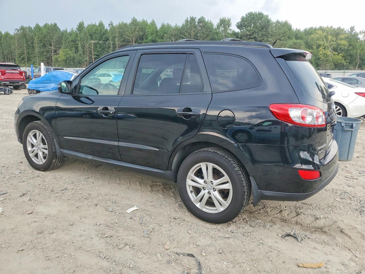 2012 Hyundai Santa Fe Se Черный vin: 5XYZHDAGXCG103878