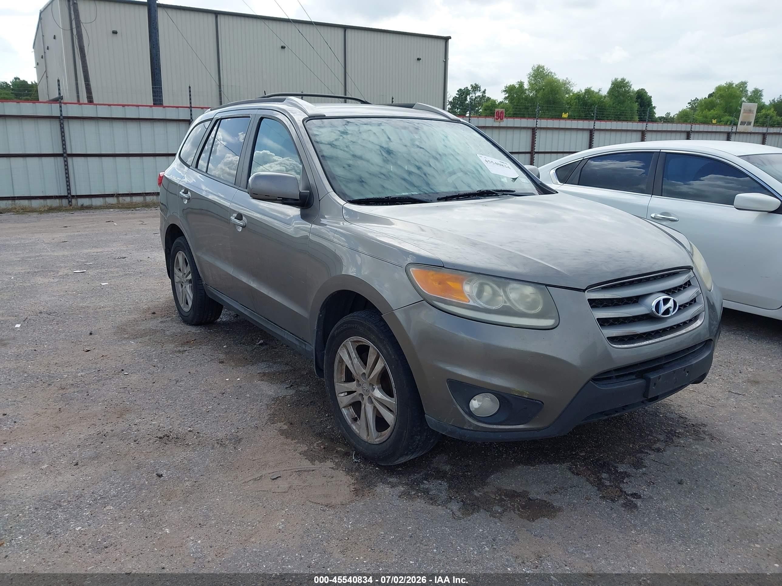 2012 Hyundai Santa Fe Limited V6 Tan vin: 5XYZKDAG0CG096277