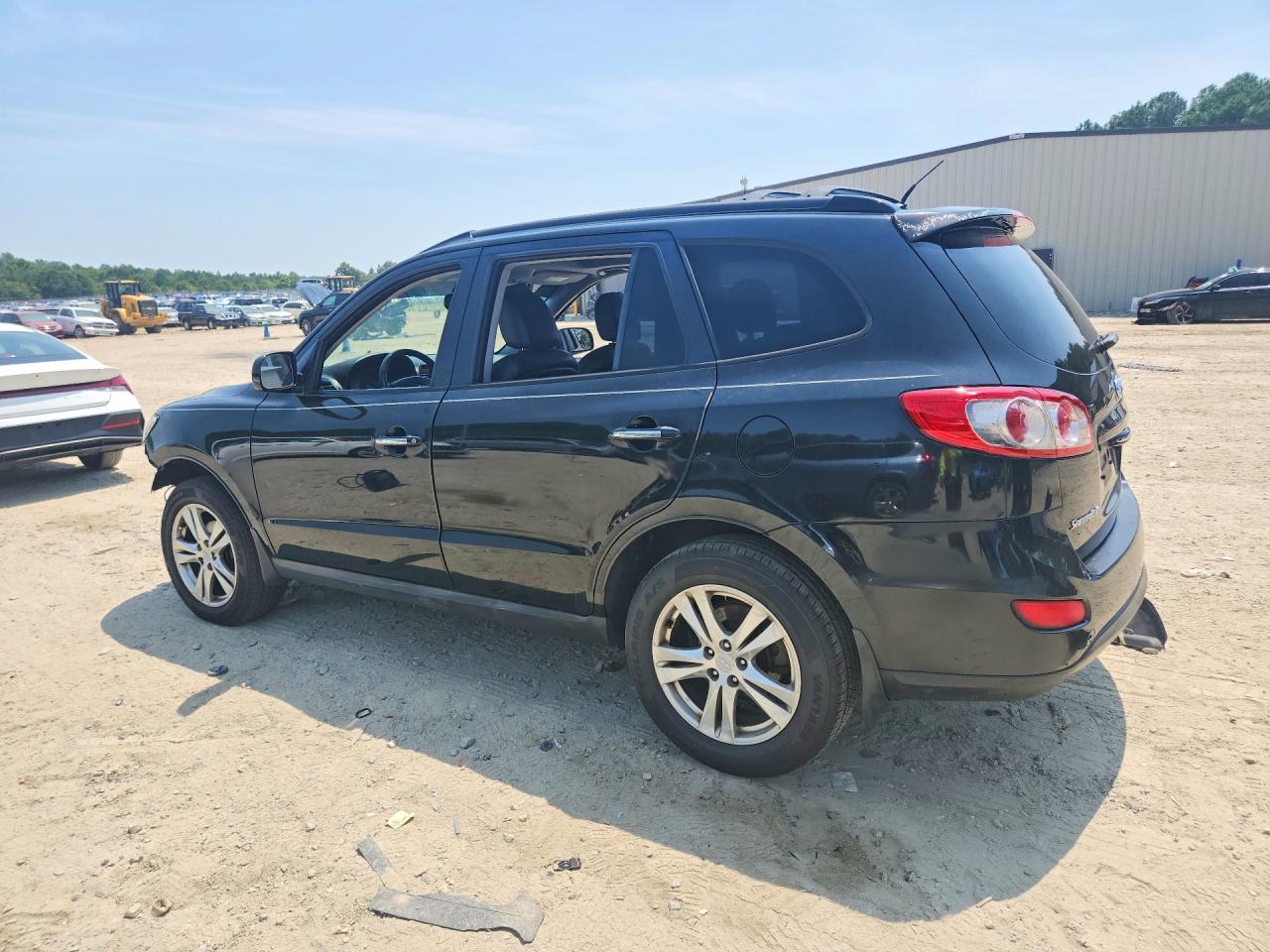 2012 Hyundai Santa Fe Limited Black vin: 5XYZKDAG7CG140095