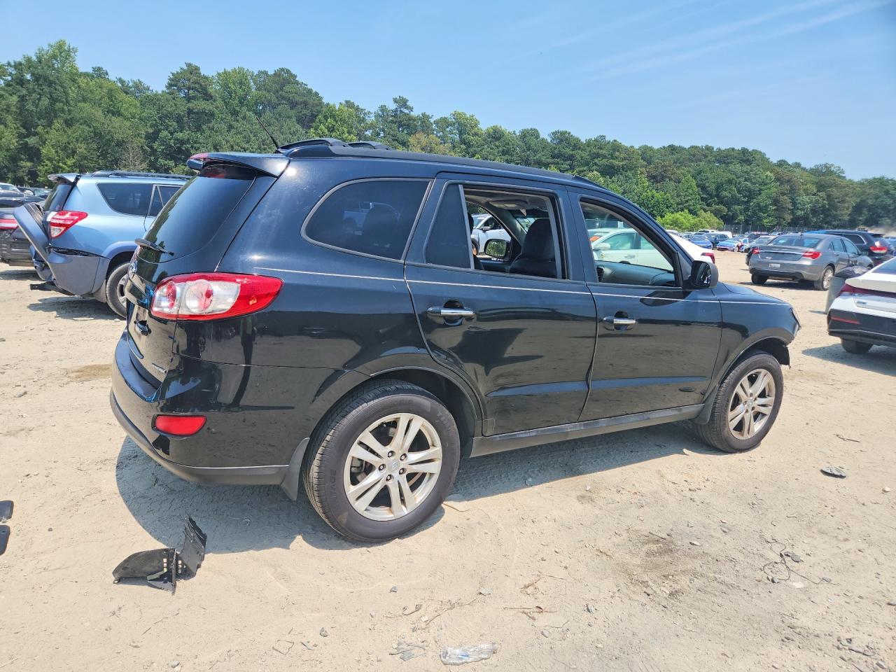 2012 Hyundai Santa Fe Limited Black vin: 5XYZKDAG7CG140095