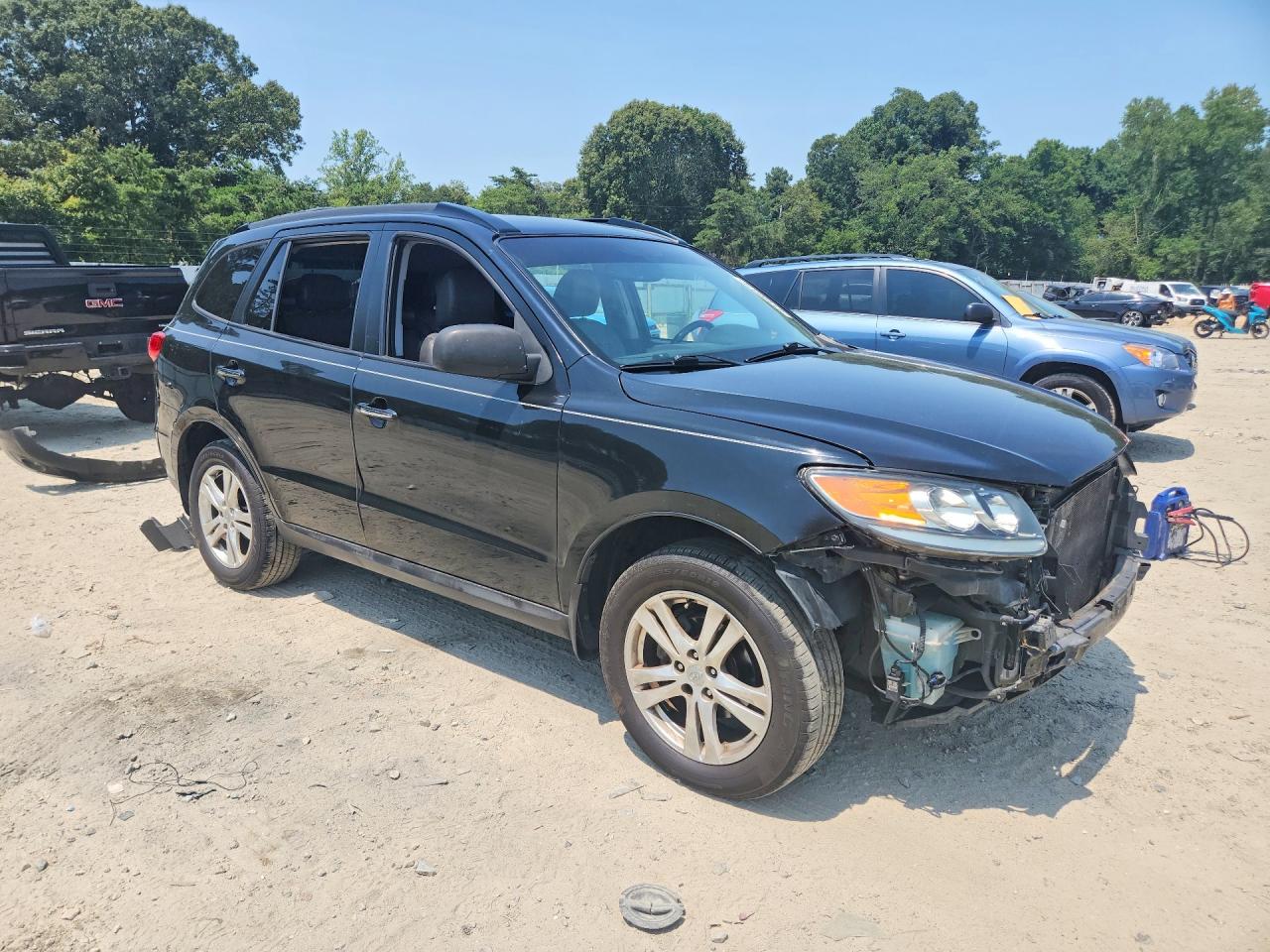 2012 Hyundai Santa Fe Limited Black vin: 5XYZKDAG7CG140095