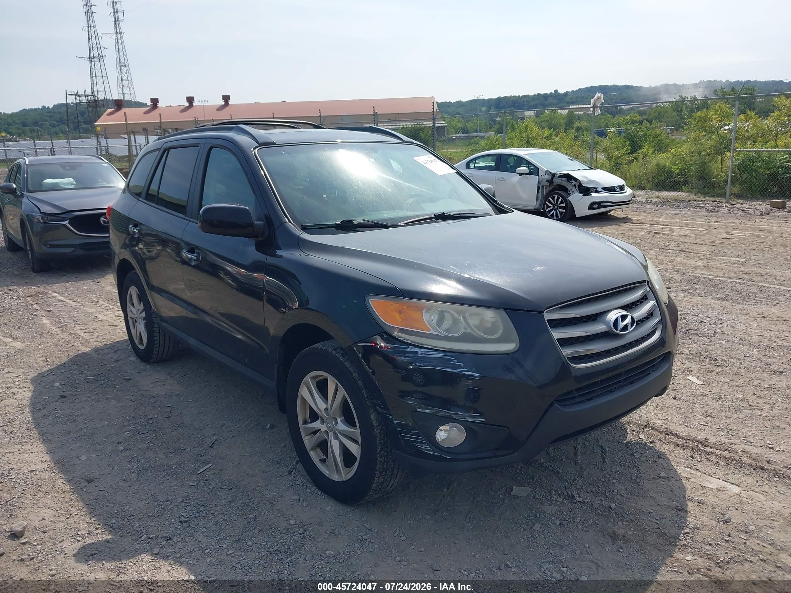 2012 Hyundai Santa Fe Limited V6 Black vin: 5XYZKDAGXCG095461