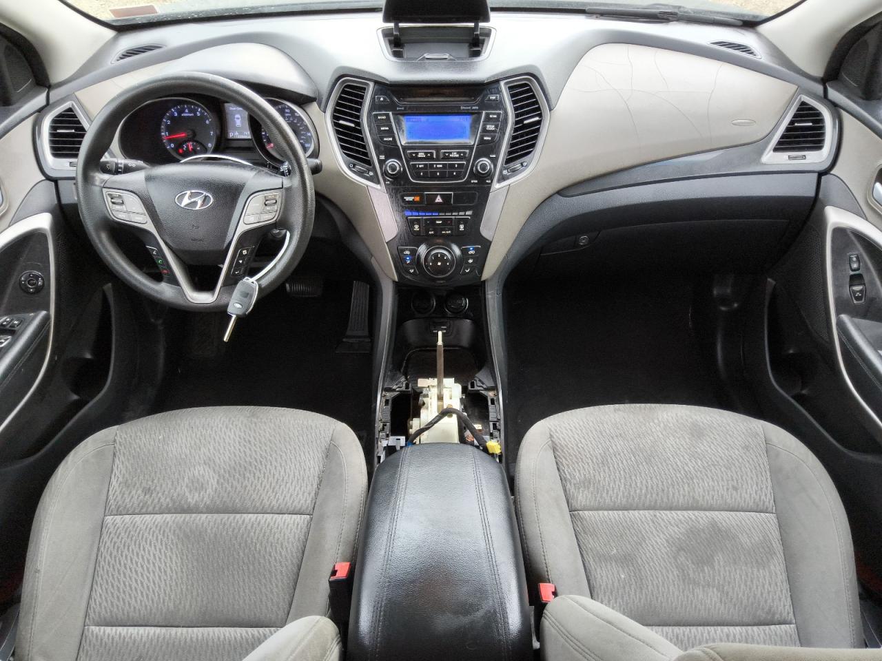 2015 Hyundai Santa Fe Sport 2.4l Blue vin: 5XYZT3LB8FG272182 Damage: Left Front Seat, Stained, Permanent
