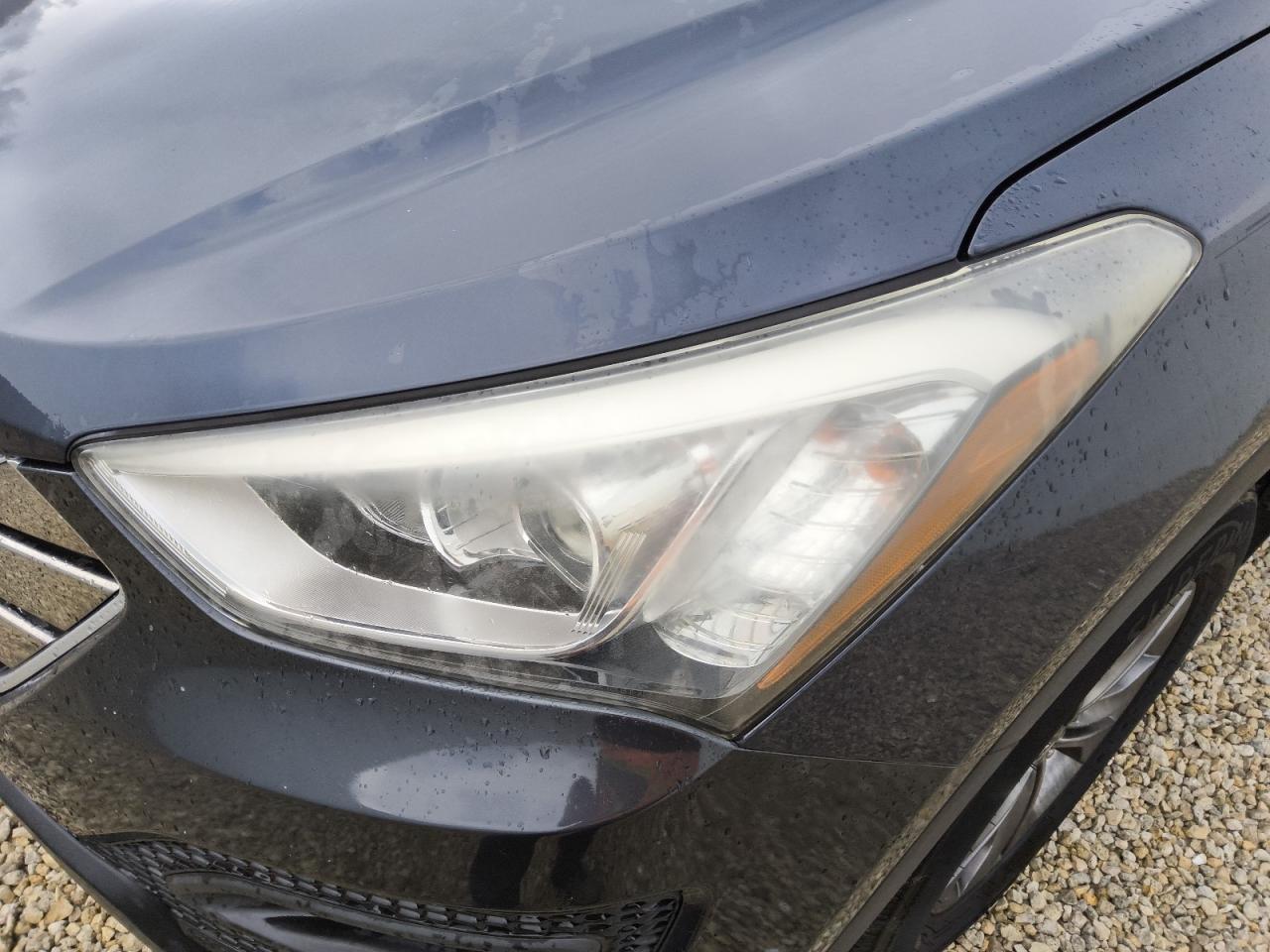 2015 Hyundai Santa Fe Sport 2.4l Blue vin: 5XYZT3LB8FG272182 Damage: Left Head Lamp, Water Damage, Replacement Required