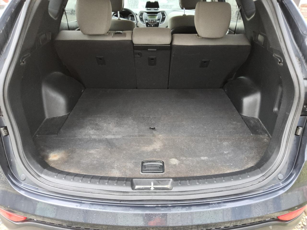 2015 Hyundai Santa Fe Sport 2.4l Blue vin: 5XYZT3LB8FG272182 Damage: Trunk/Cargo Mat, Stained, Permanent