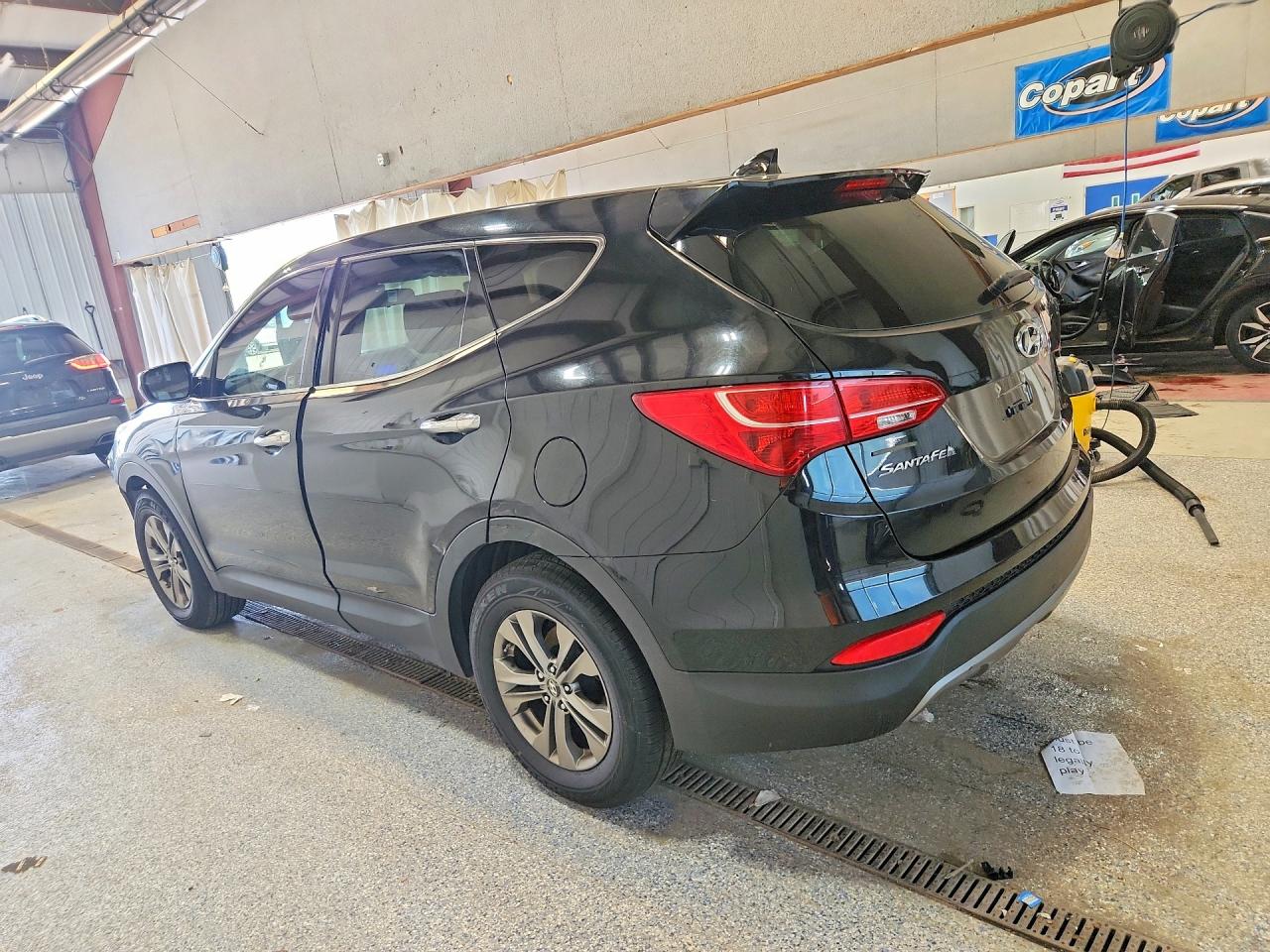 2015 Hyundai Santa Fe Sport 2.4l Черный vin: 5XYZT3LB9FG240714