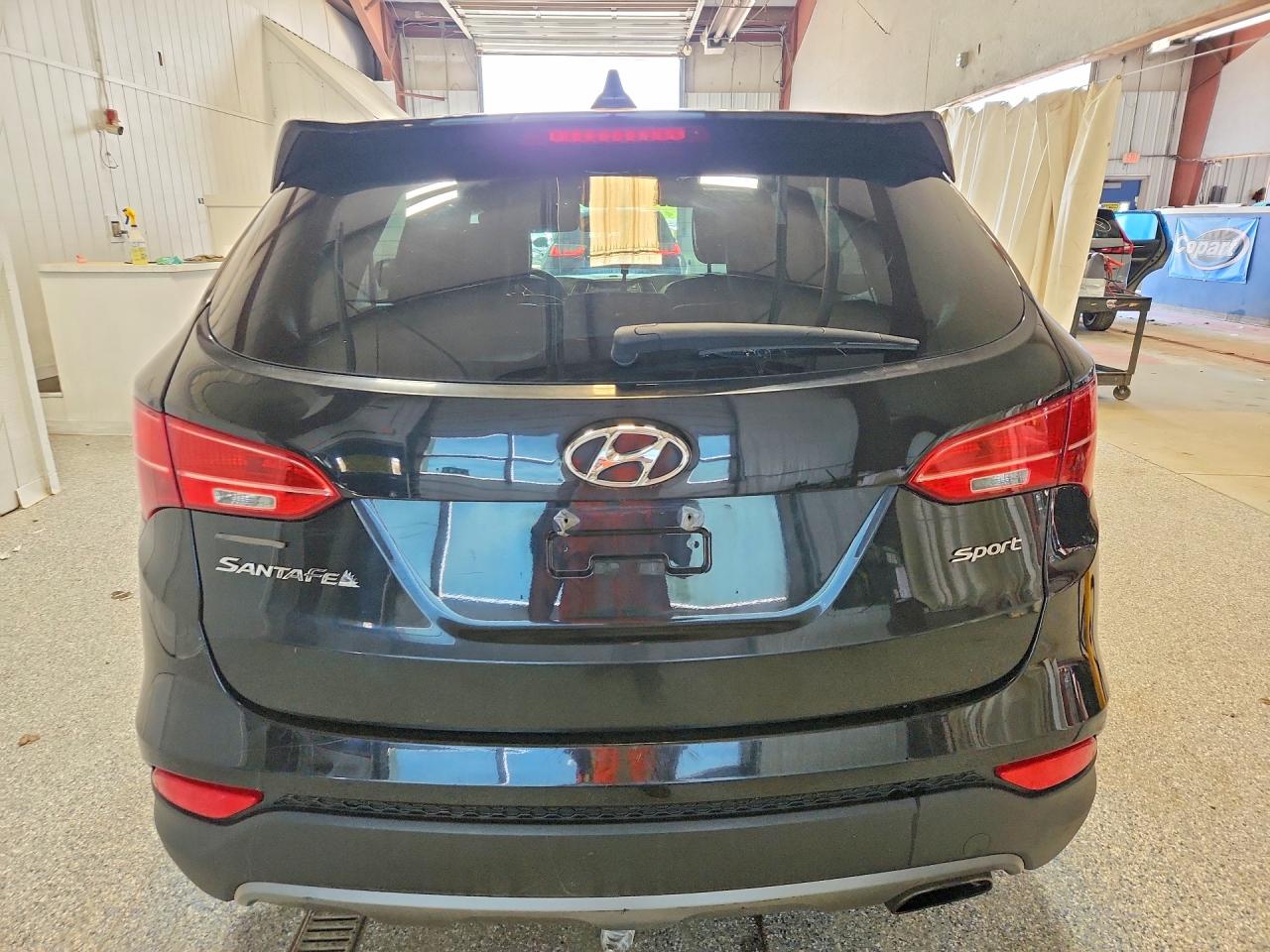 2015 Hyundai Santa Fe Sport 2.4l Черный vin: 5XYZT3LB9FG240714
