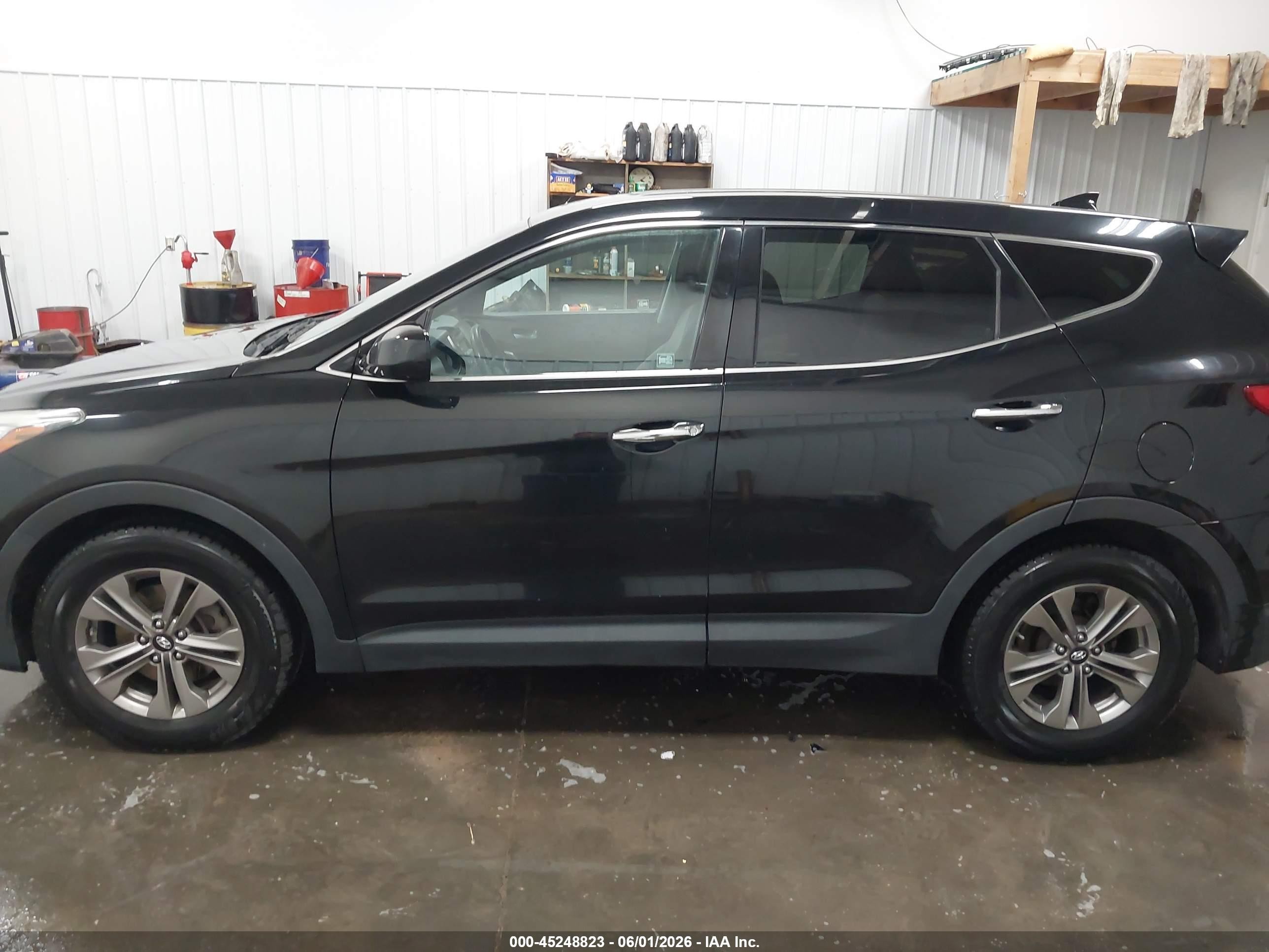 2015 Hyundai Santa Fe Sport 2.4l Черный vin: 5XYZTDLB3FG266408