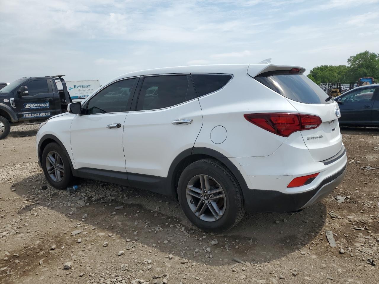 2017 Hyundai Santa Fe Sport 2.4l White vin: 5XYZTDLB5HG391512 Damage: Rear Bumper, Multiple Scratches Heavy, 5