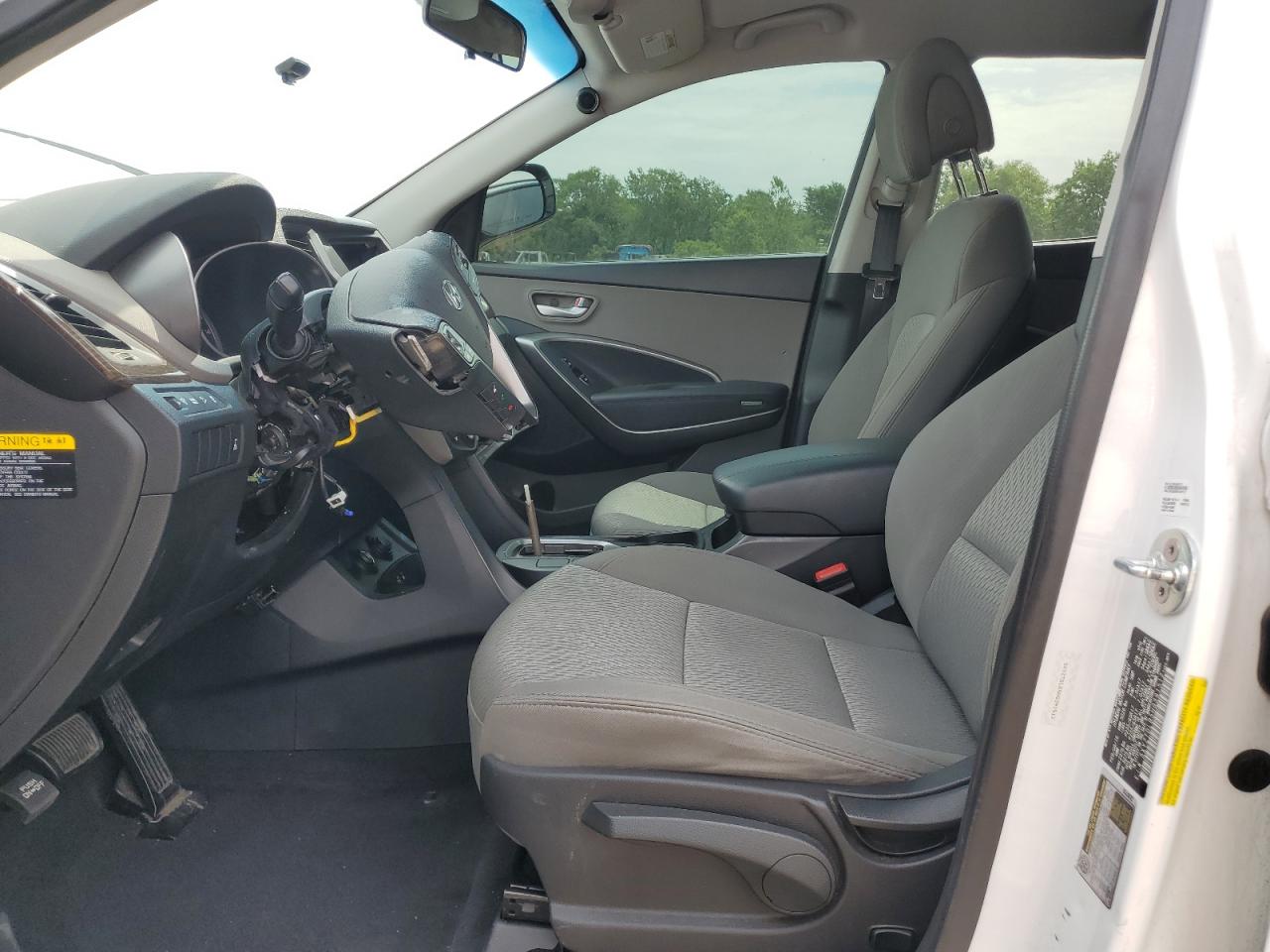 2017 Hyundai Santa Fe Sport 2.4l White vin: 5XYZTDLB5HG391512 Damage: Steering Wheel, Broken, Replacement Required