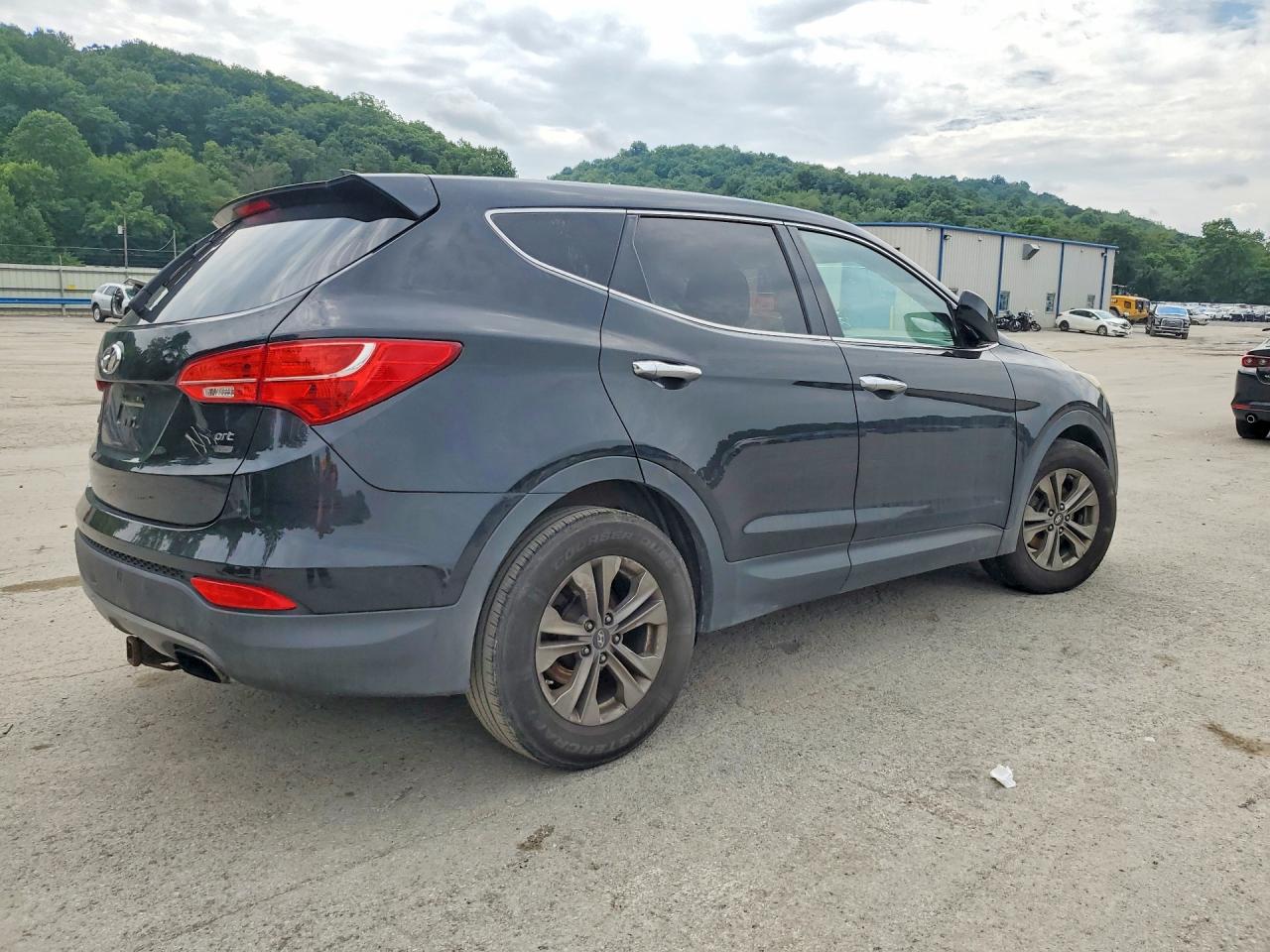 2015 Hyundai Santa Fe Sport 2.4l Черный vin: 5XYZTDLB7FG302083