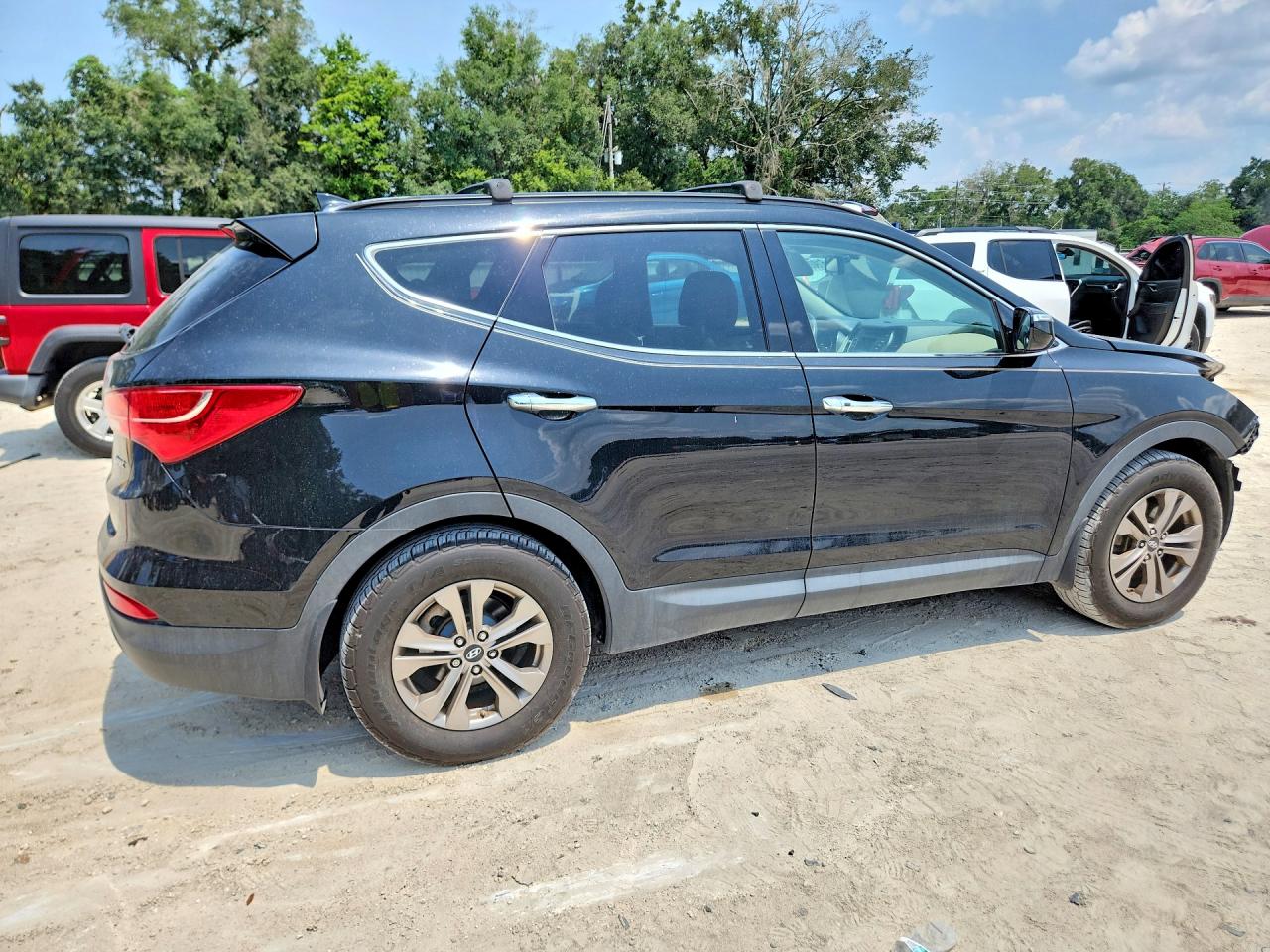 2015 Hyundai Santa Fe Sport 2.4l Черный vin: 5XYZU3LB2FG304878