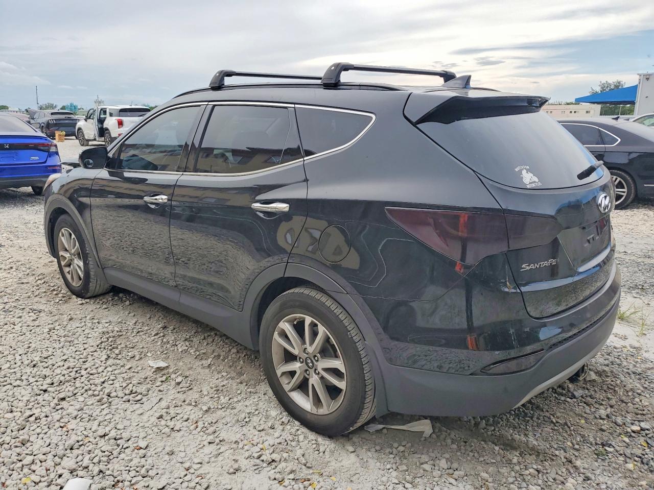 2015 Hyundai Santa Fe Sport 2.0t Черный vin: 5XYZUDLA0FG266371