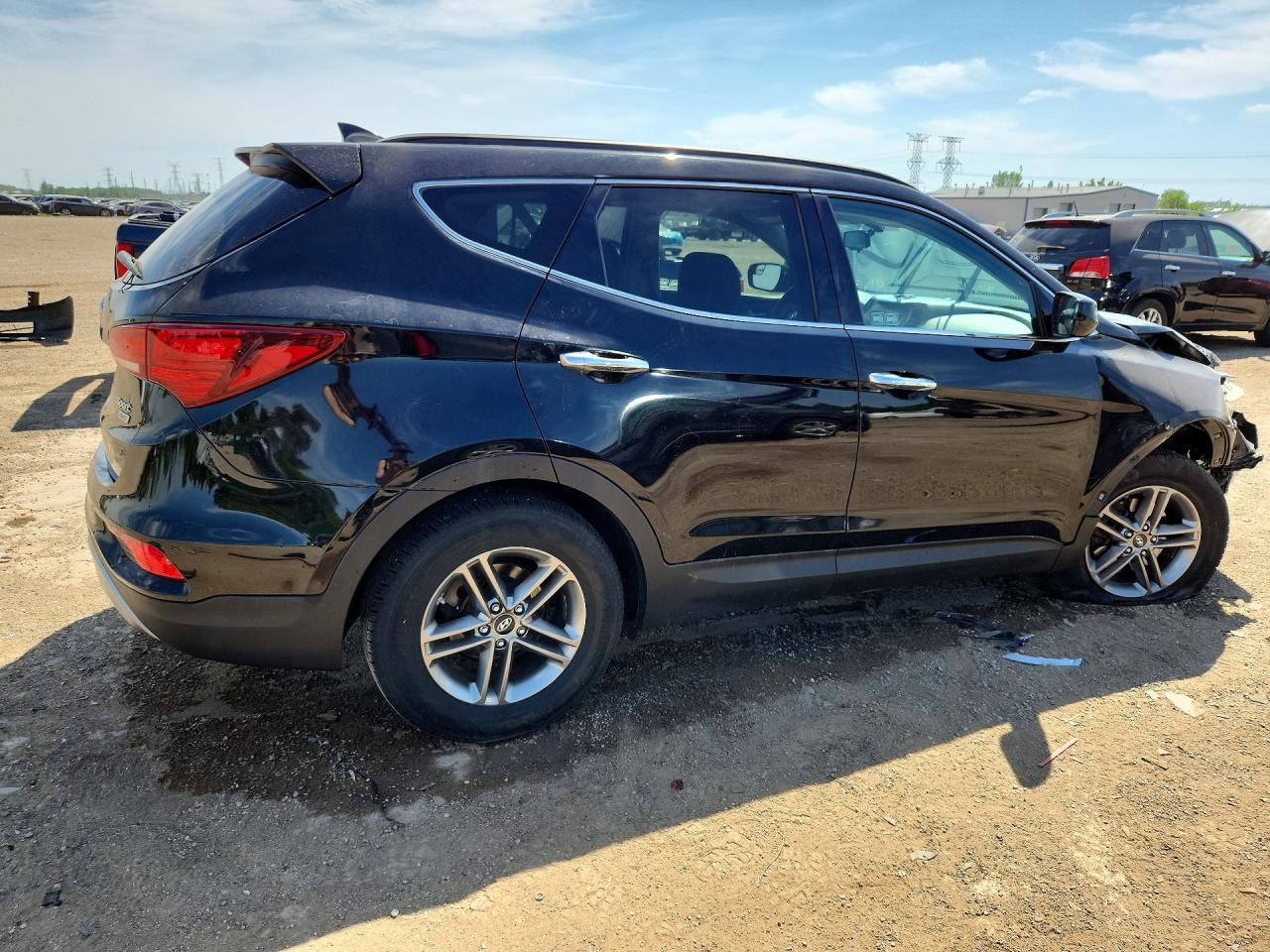 2017 Hyundai Santa Fe Sport 2.4l Черный vin: 5XYZUDLB6HG398191
