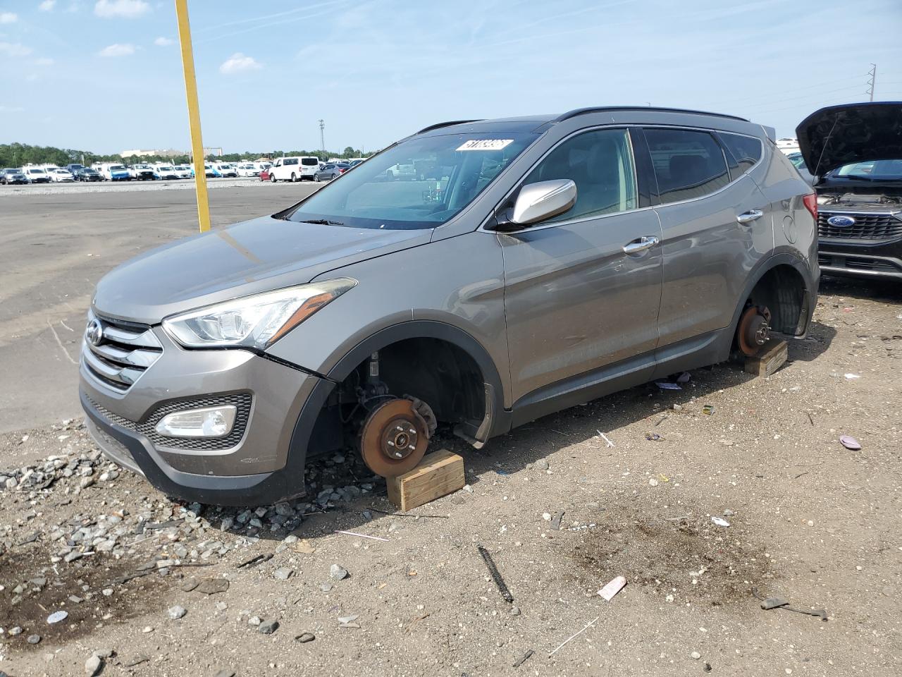 2015 Hyundai Santa Fe Sport 2.4l Gray vin: 5XYZUDLB8FG285193 Damage: Left Front Wheel, Missing, Replacement Required